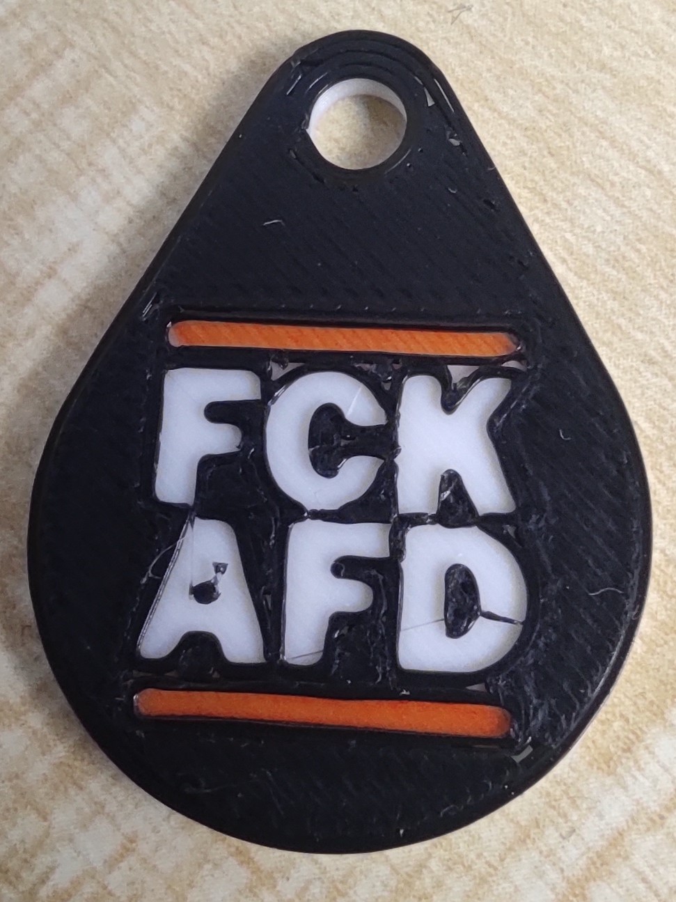 1€ FCK AFD shopping cart tag 2 color version