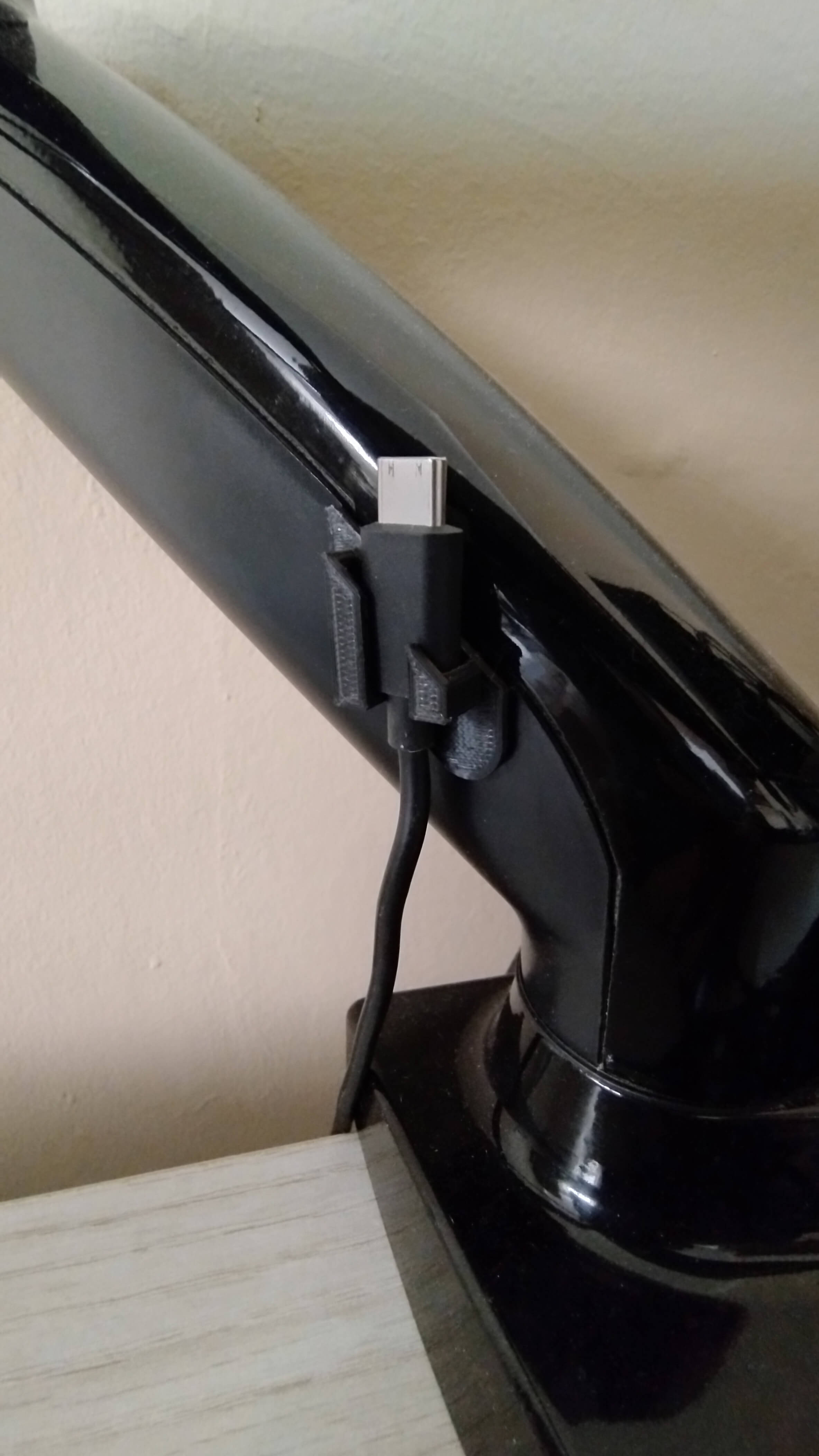 Monitor arm support cable clip