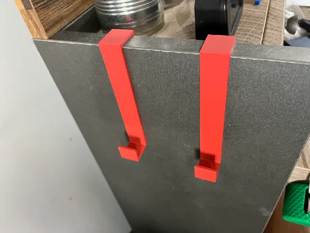 Table side phone hanger