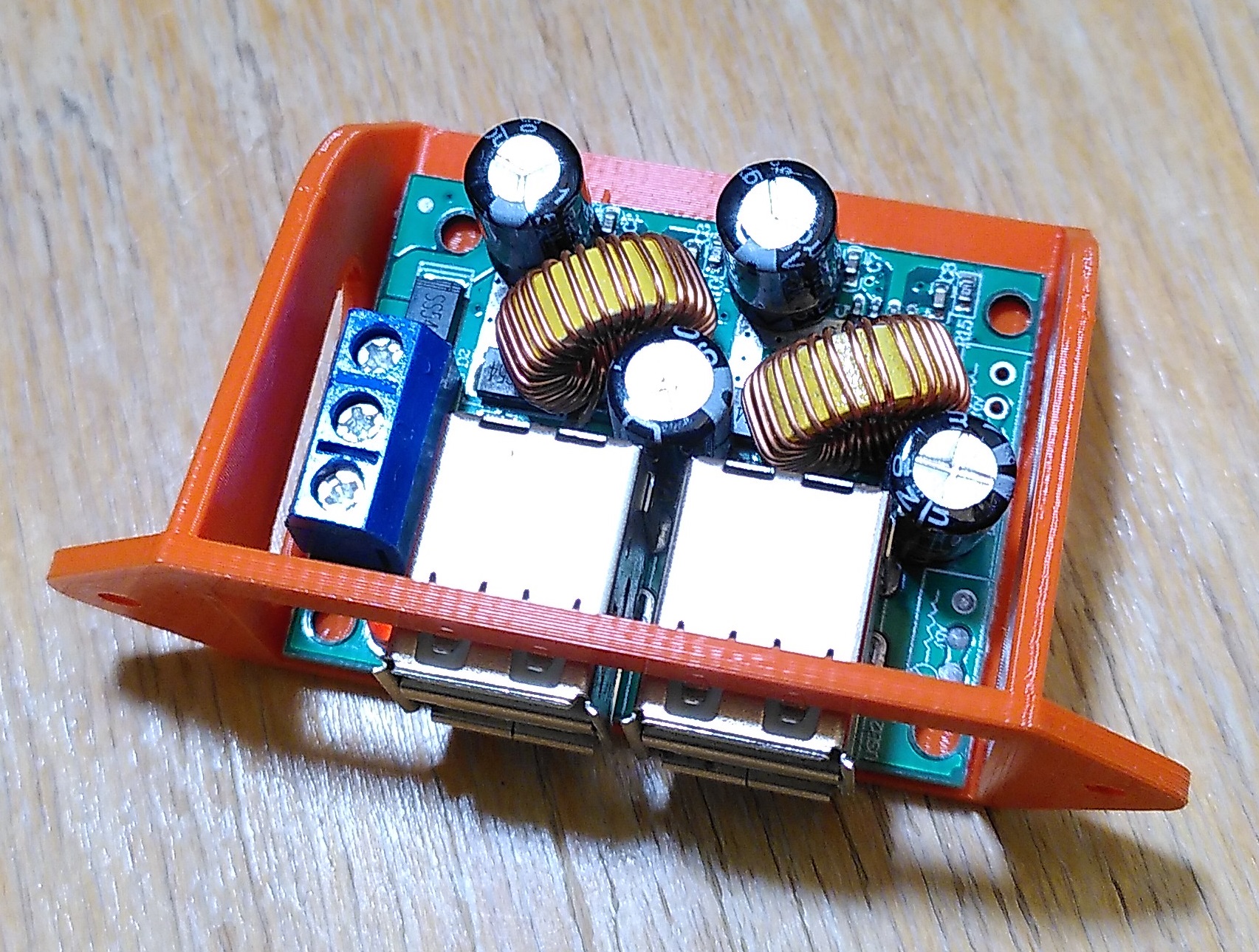 Mount to attach 4x USB supply behind front panel