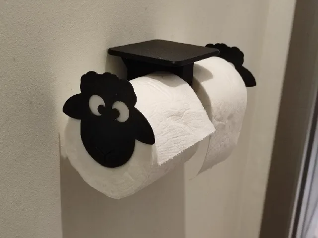 Double sheep toilet paper holder with a shelf
