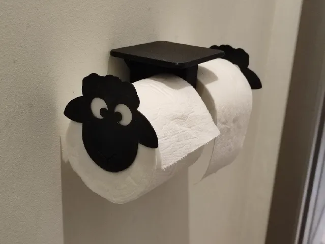 Double sheep toilet paper holder with a shelf