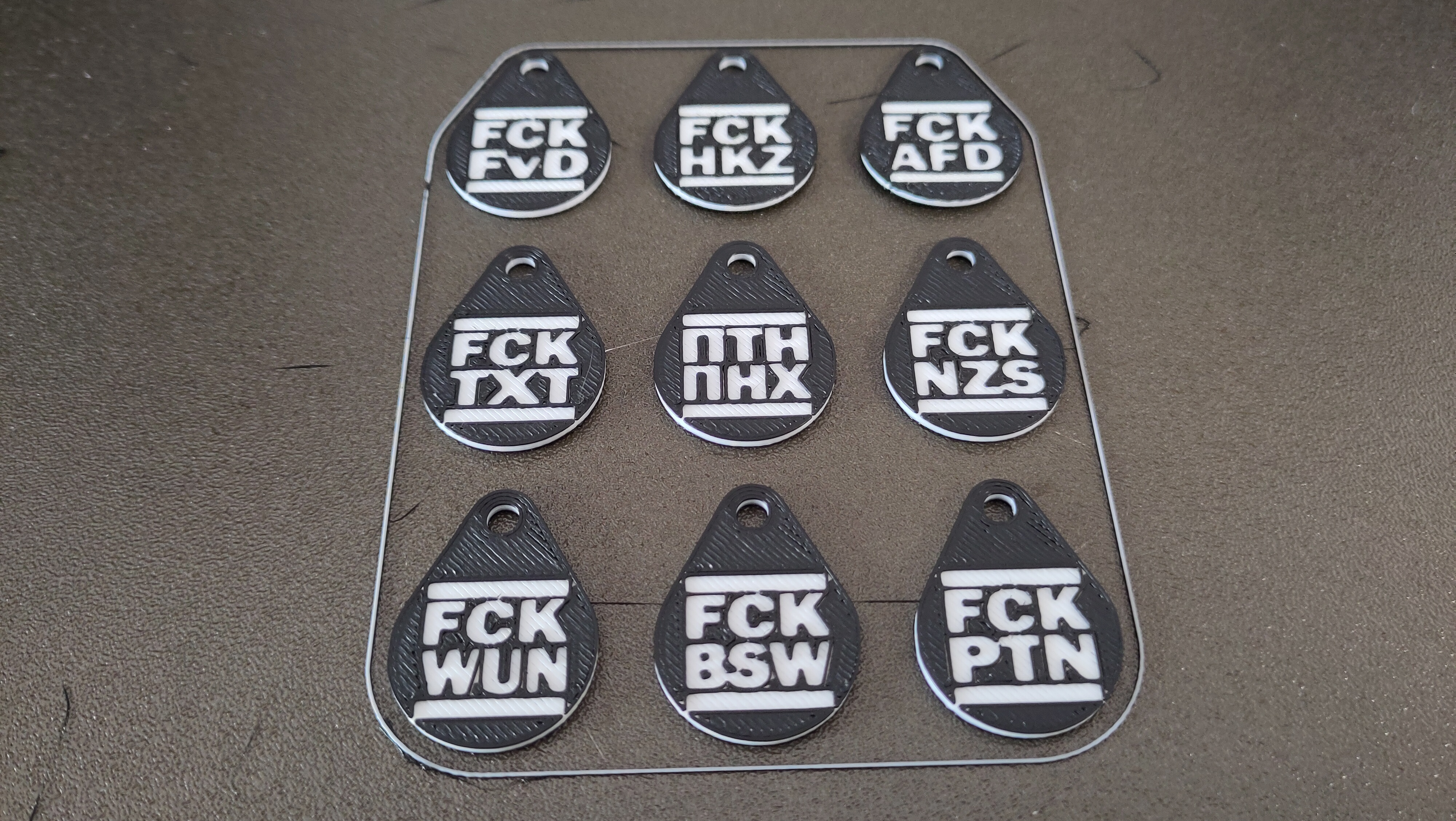 1€ FCK AFD,  FvD, HKZ, NZS, PTN, BSW, WUN and ПТН ПНХ shopping cart tag 2 color version front and back