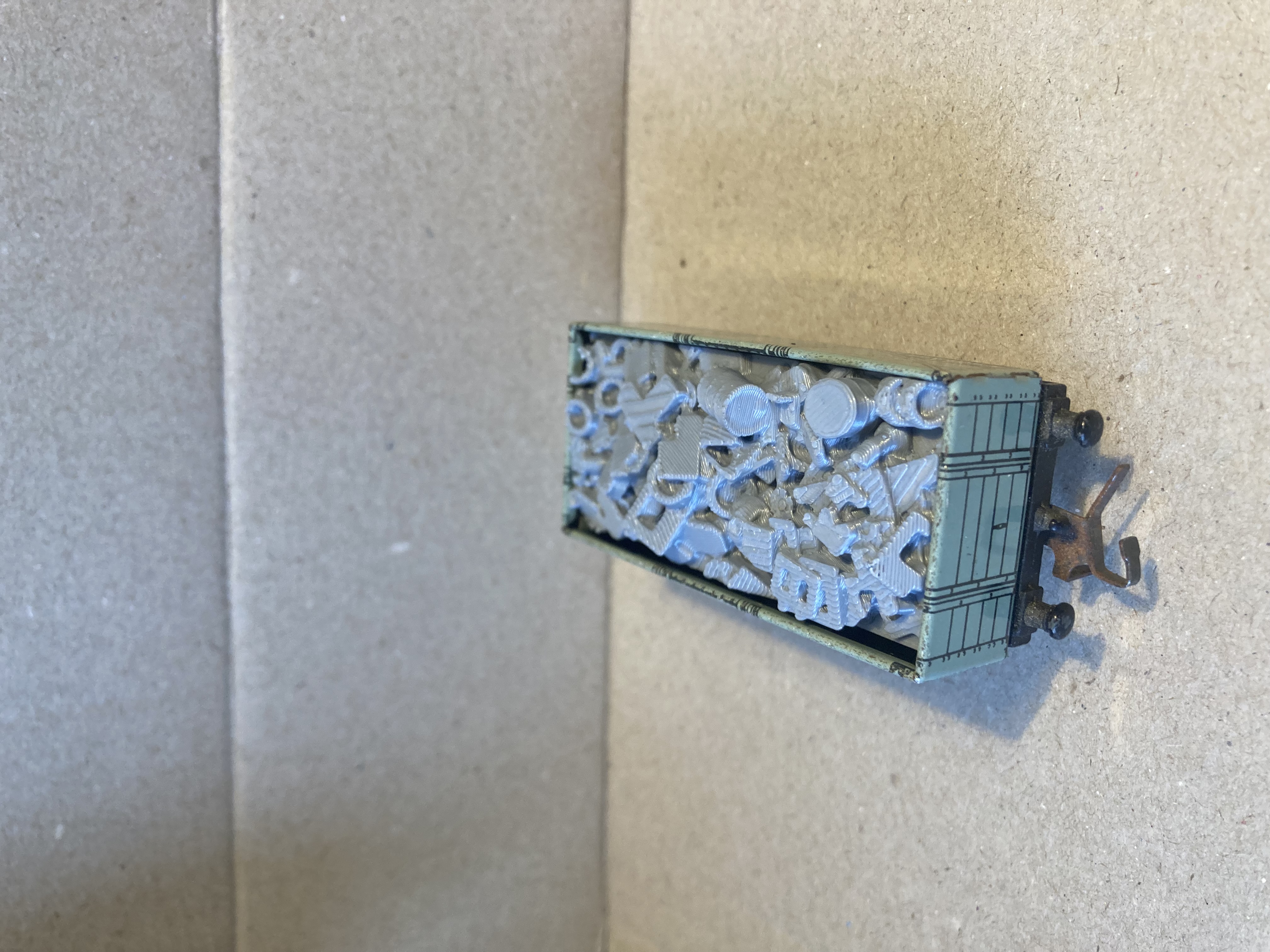 Scrap metal load for HornbyDublo 5 plank wagon.