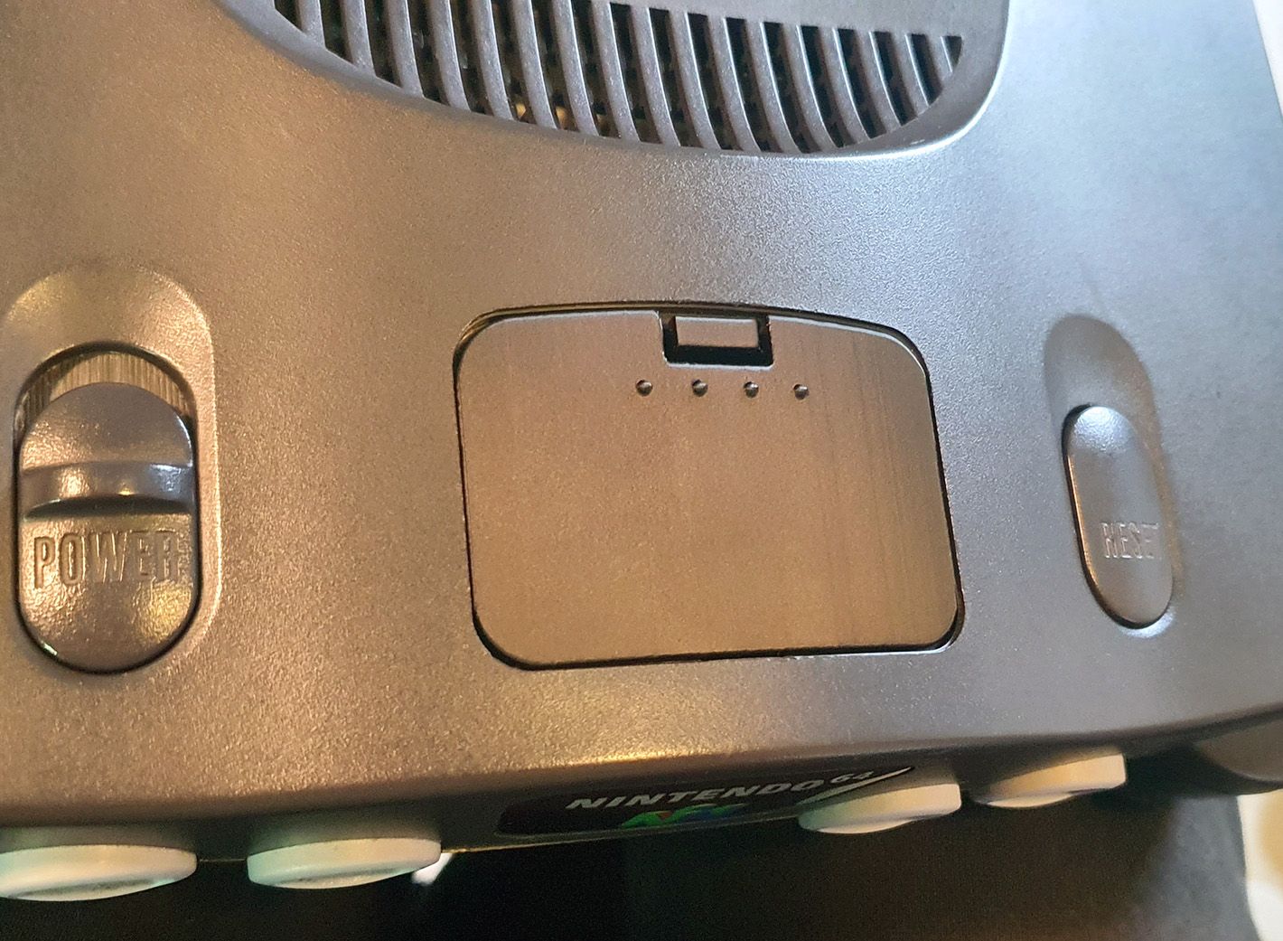 Replacement cover for Nintendo 64 memory expansion bay