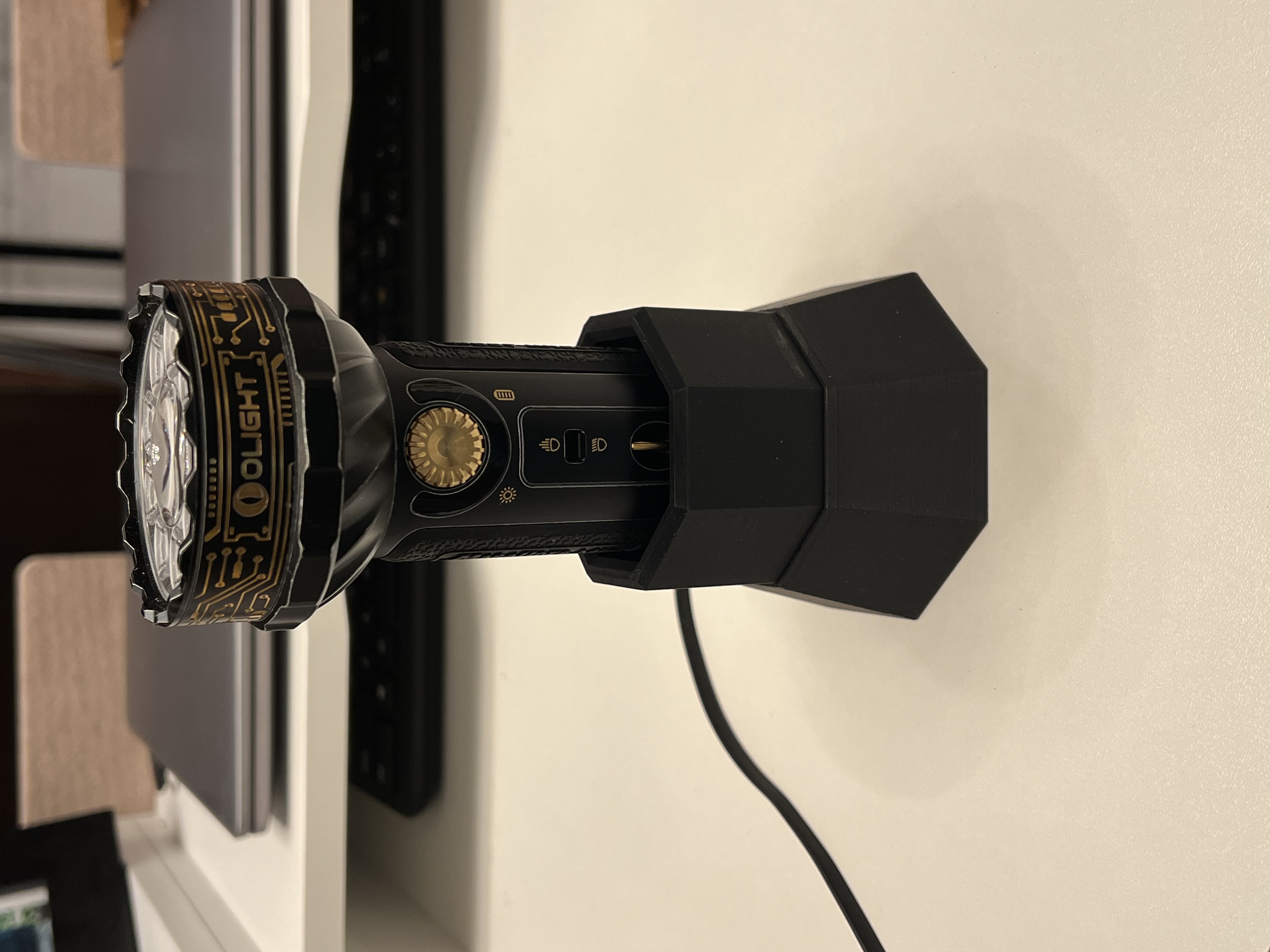 Olight Marauder mini flashlight dock