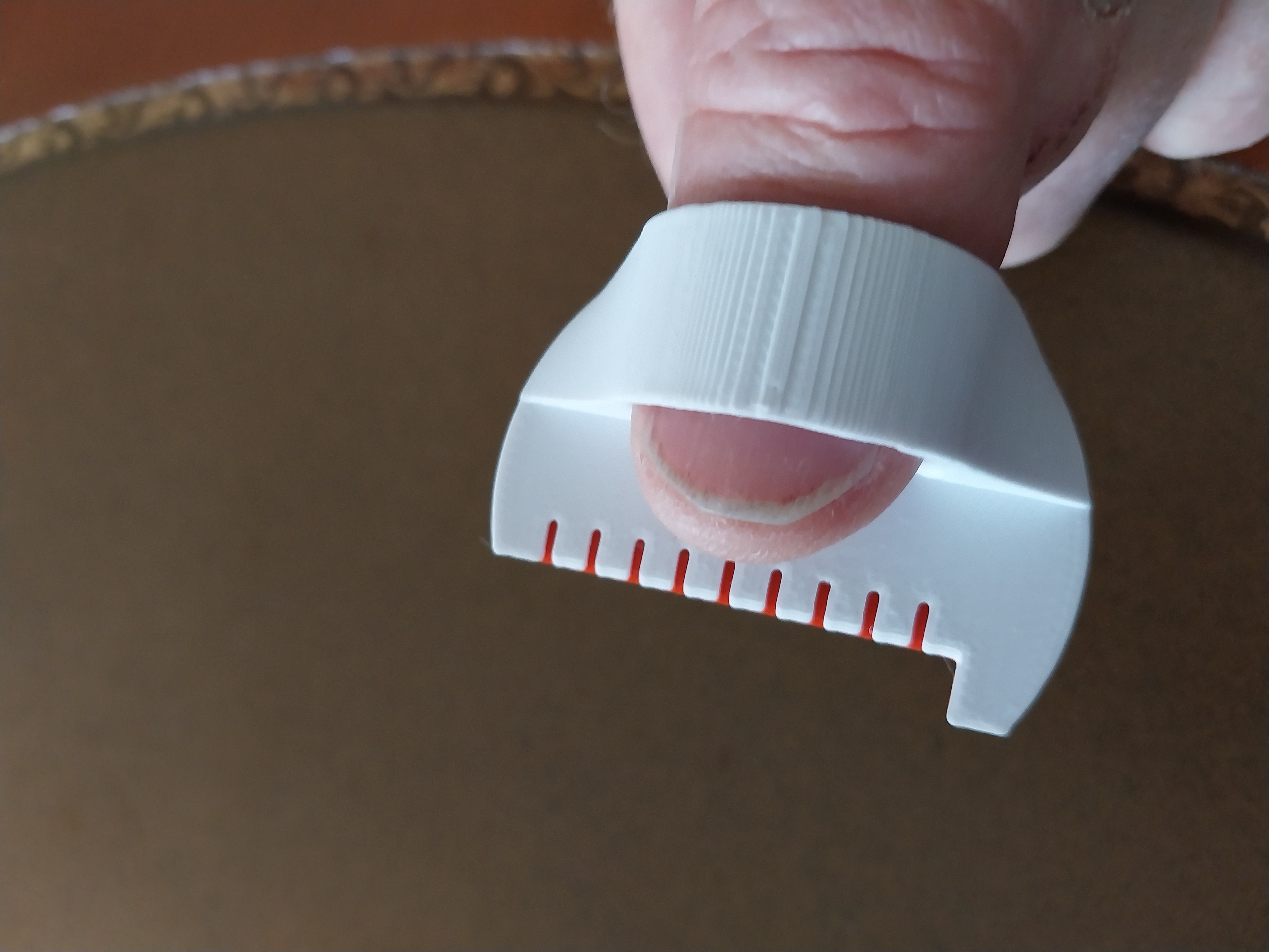 Hand sewing aid