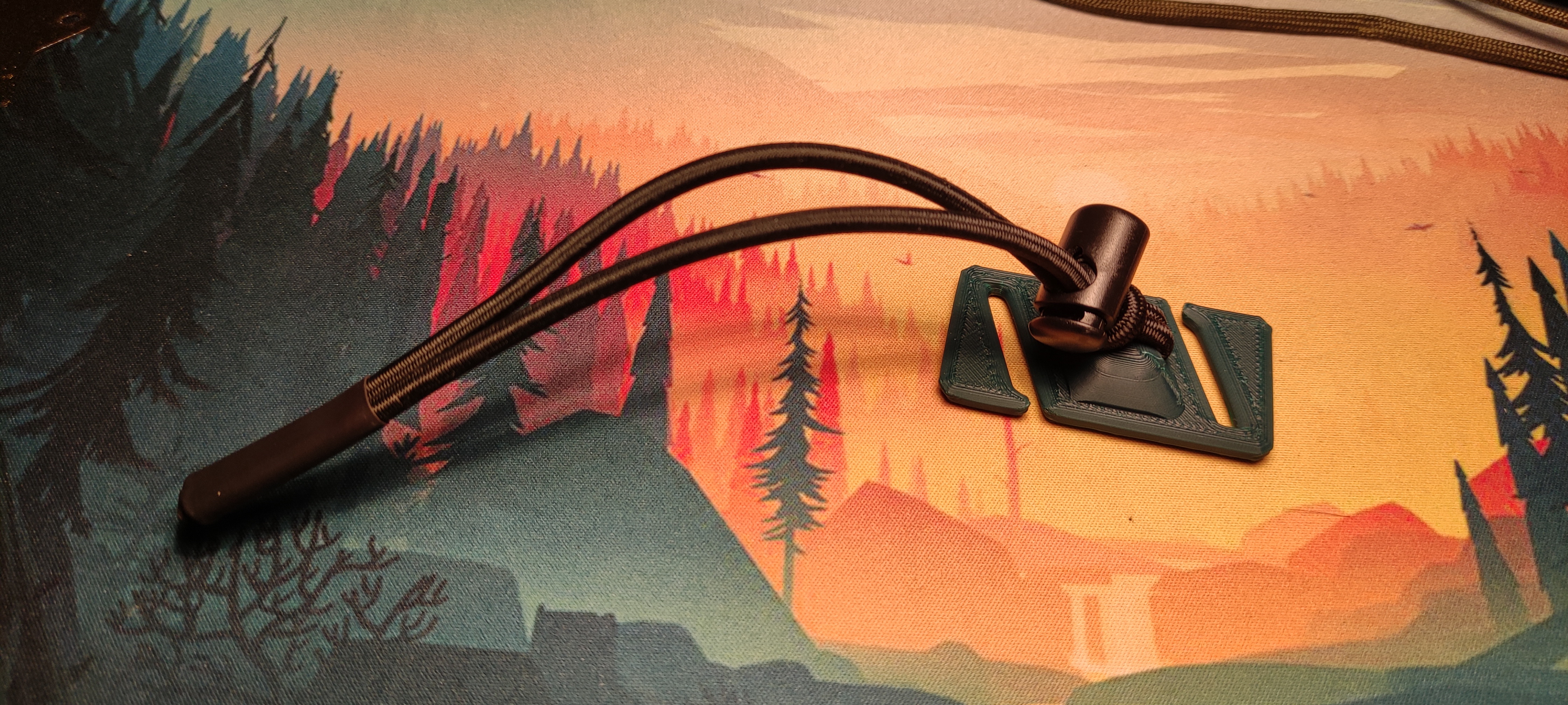 Backpack strap cord clip