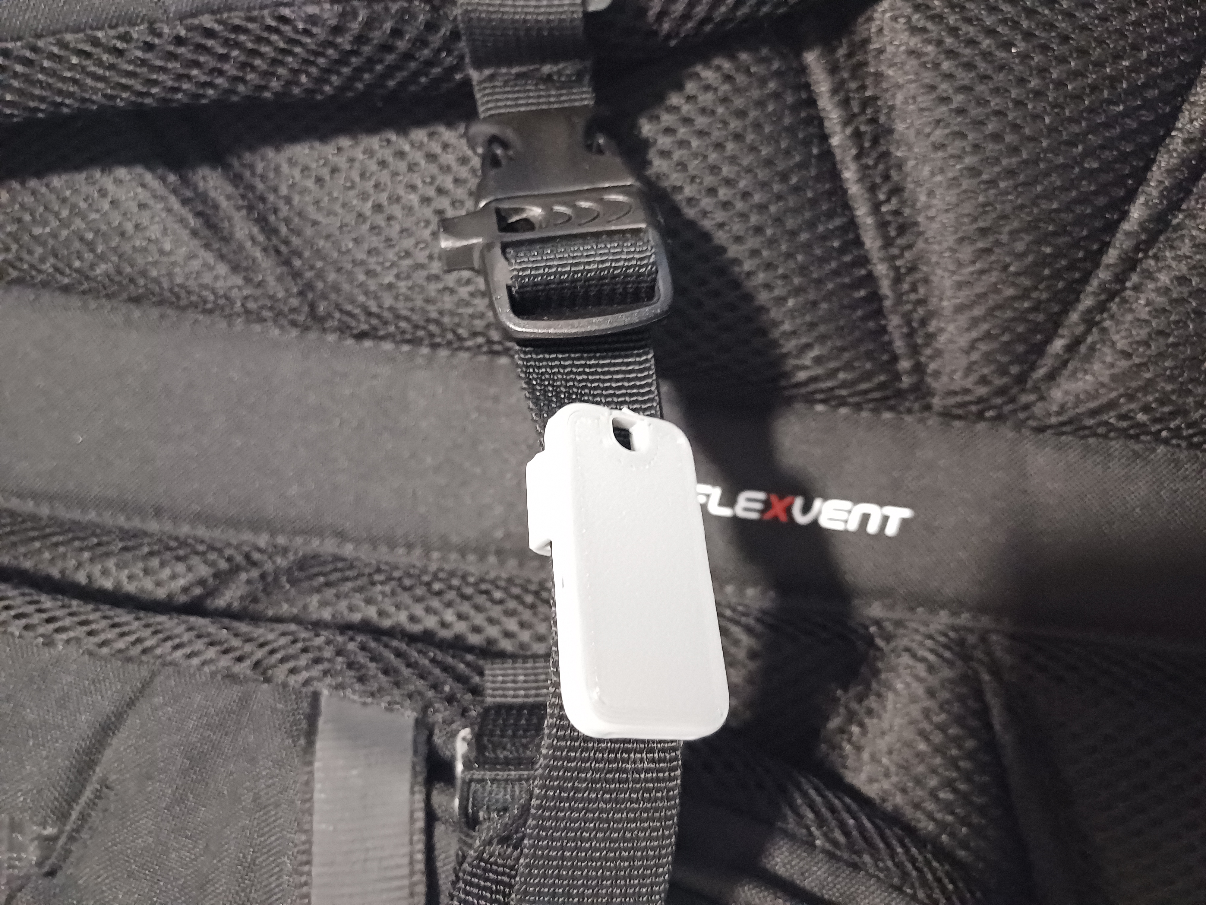 Backpack clip with whistle