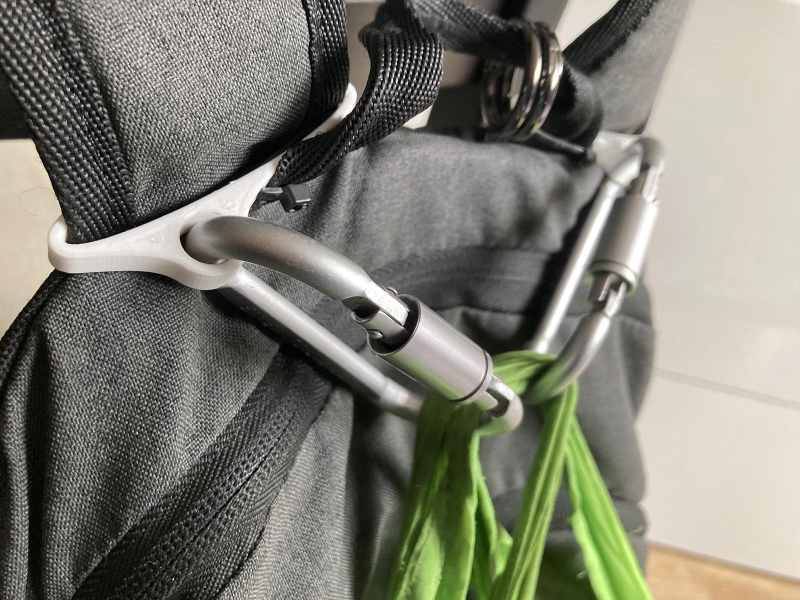 Backpack carabiner attachements
