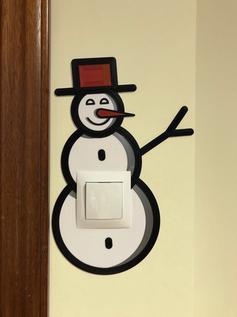 Christmas wall decoration mounted on the light switch/electrical outlet
