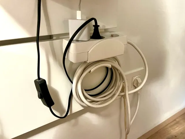 IKEA Nordli head board power strip holder