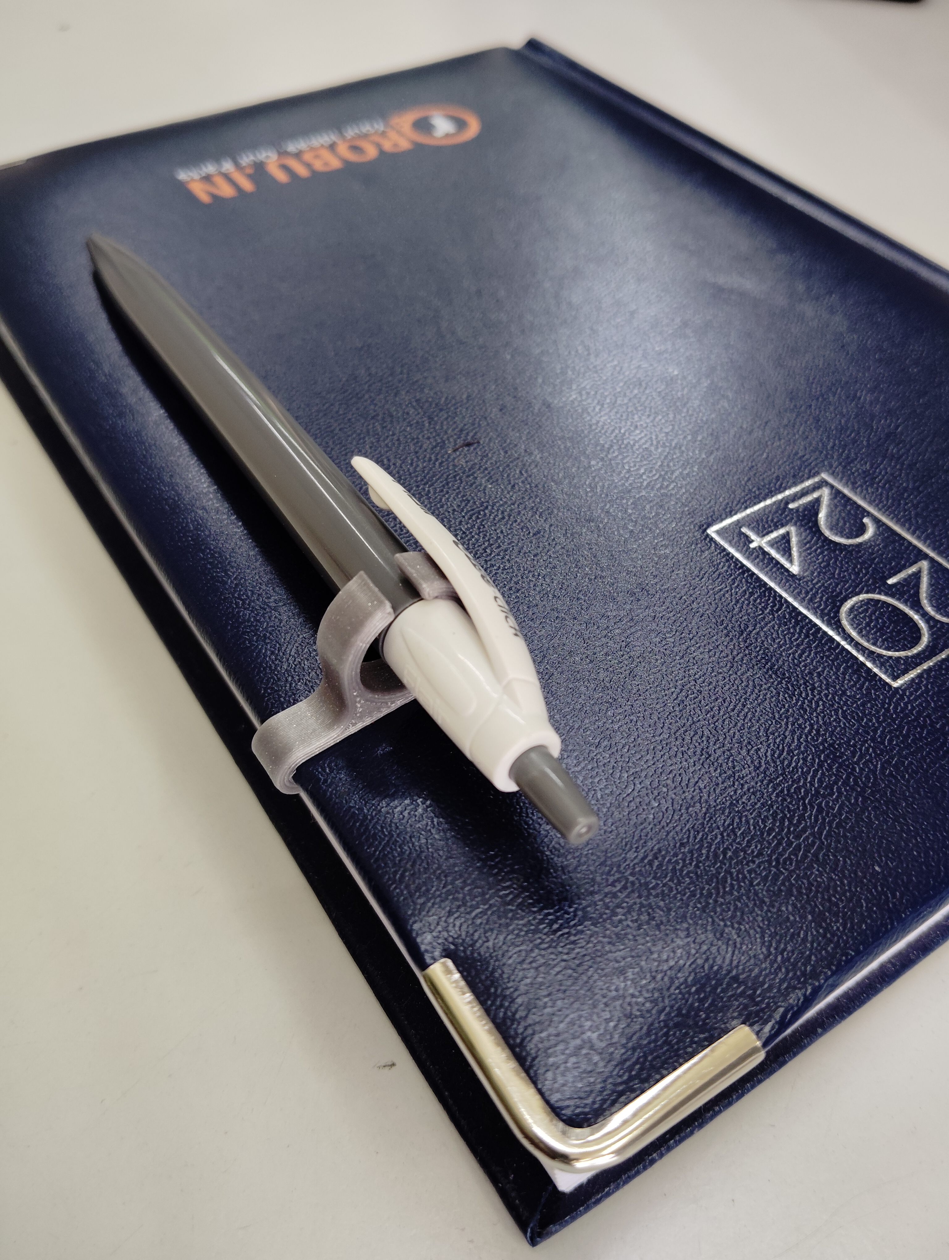 Diary pen holder