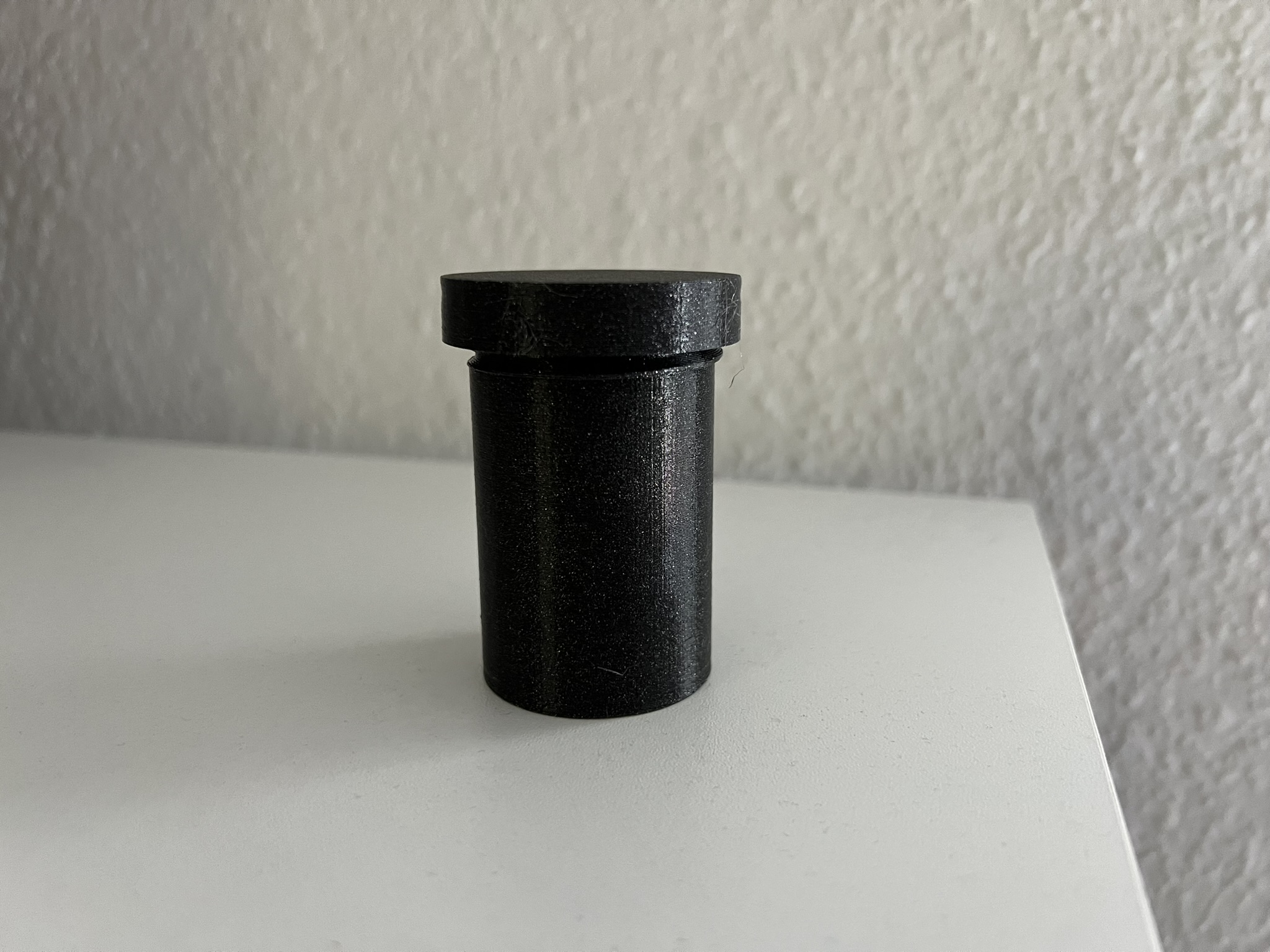 Round container with screw cap