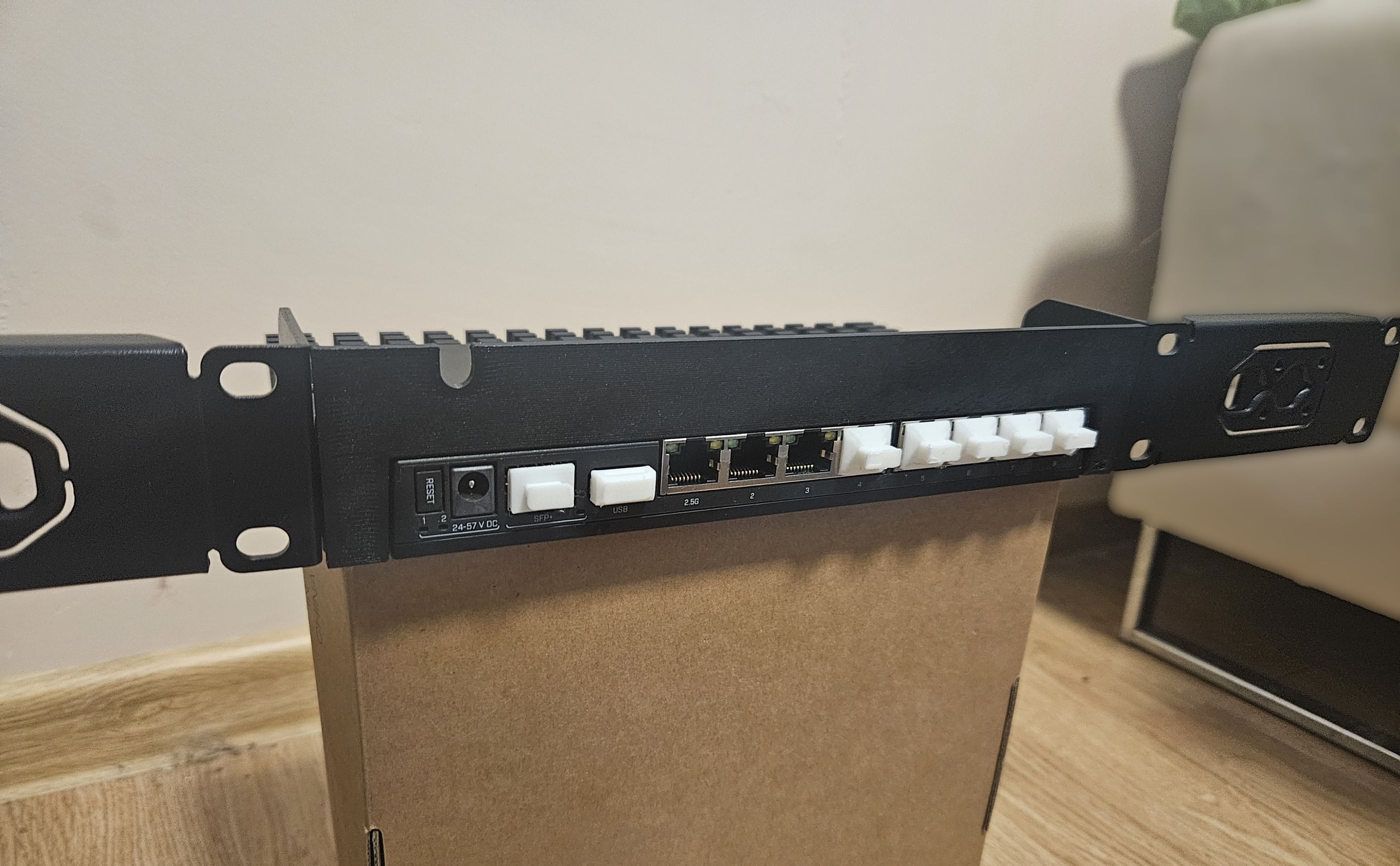 Mikrotik RB5009 rack cover with power cable cutout