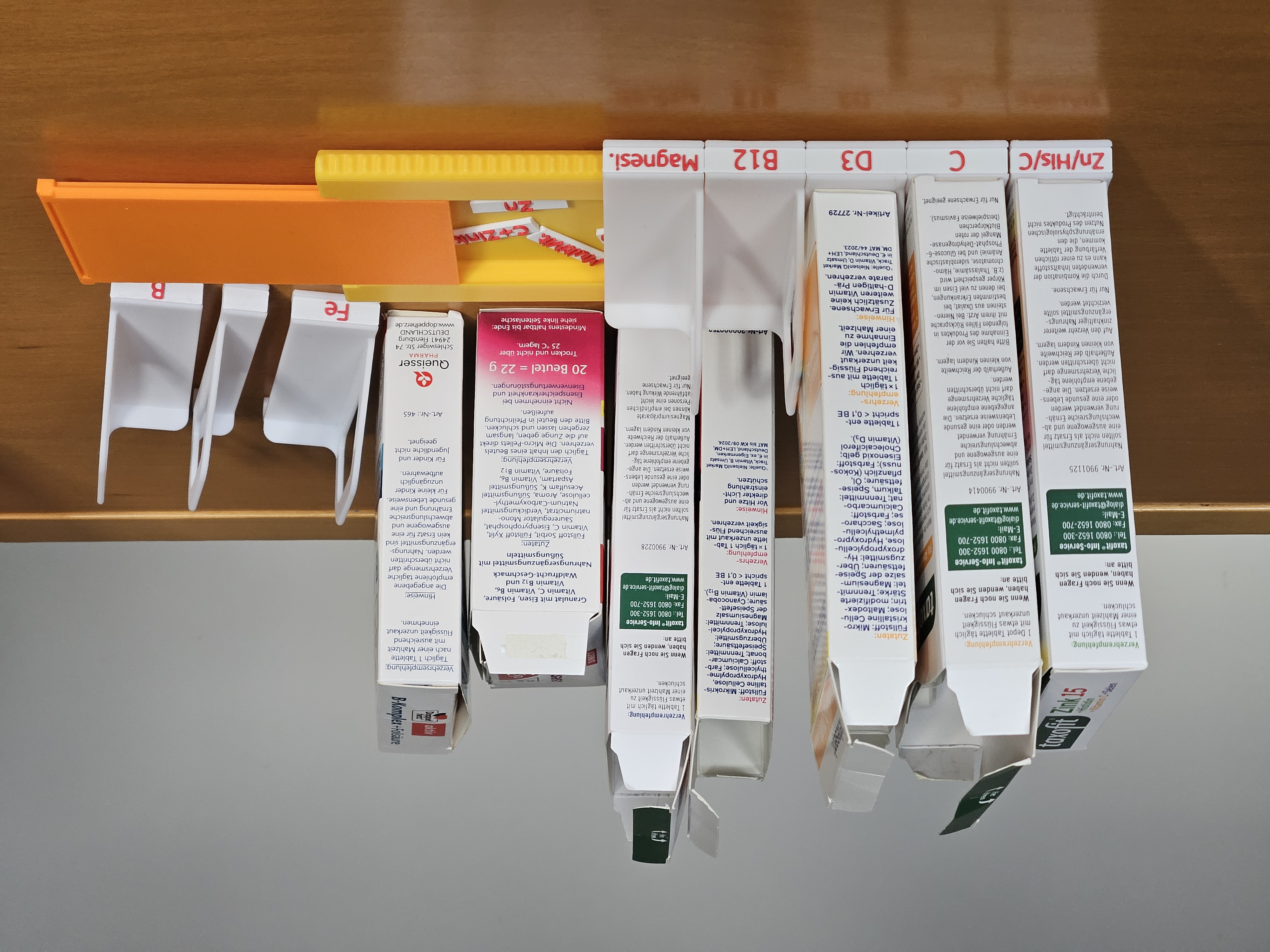 Stand for Vitamin and Mineral Supplement Boxes