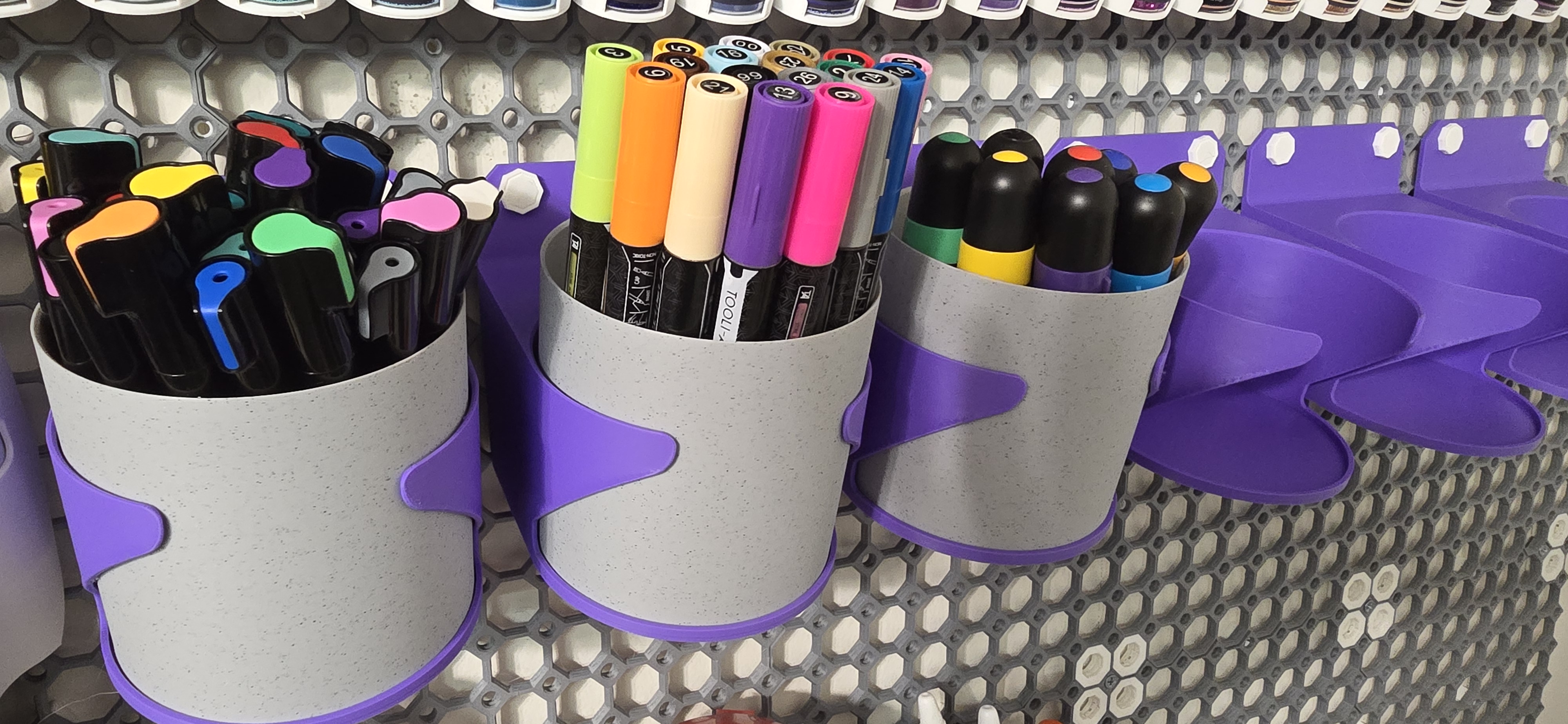 Storage cup and wall mounted holder for Multiboard