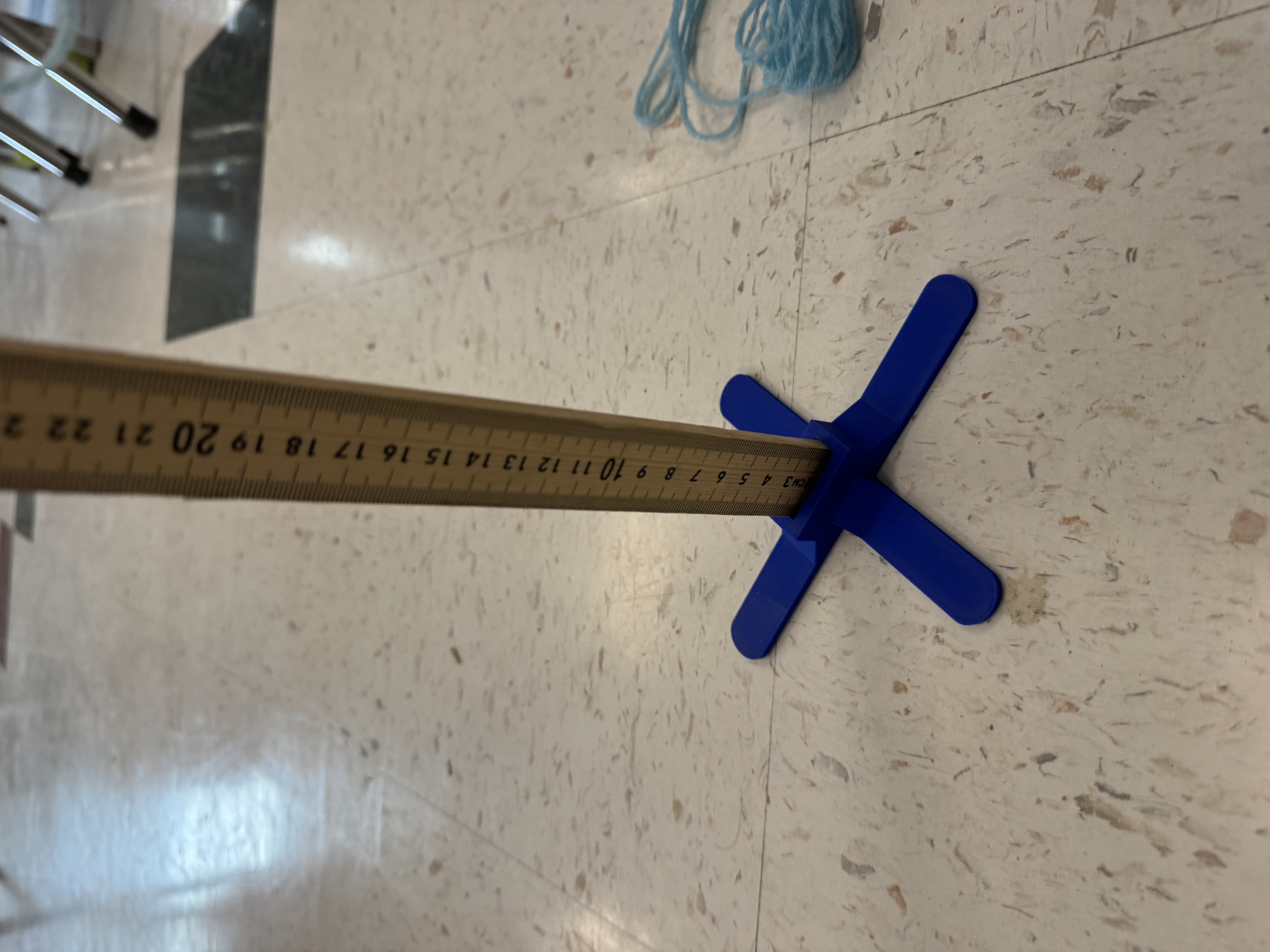 Vertical meter stick holder