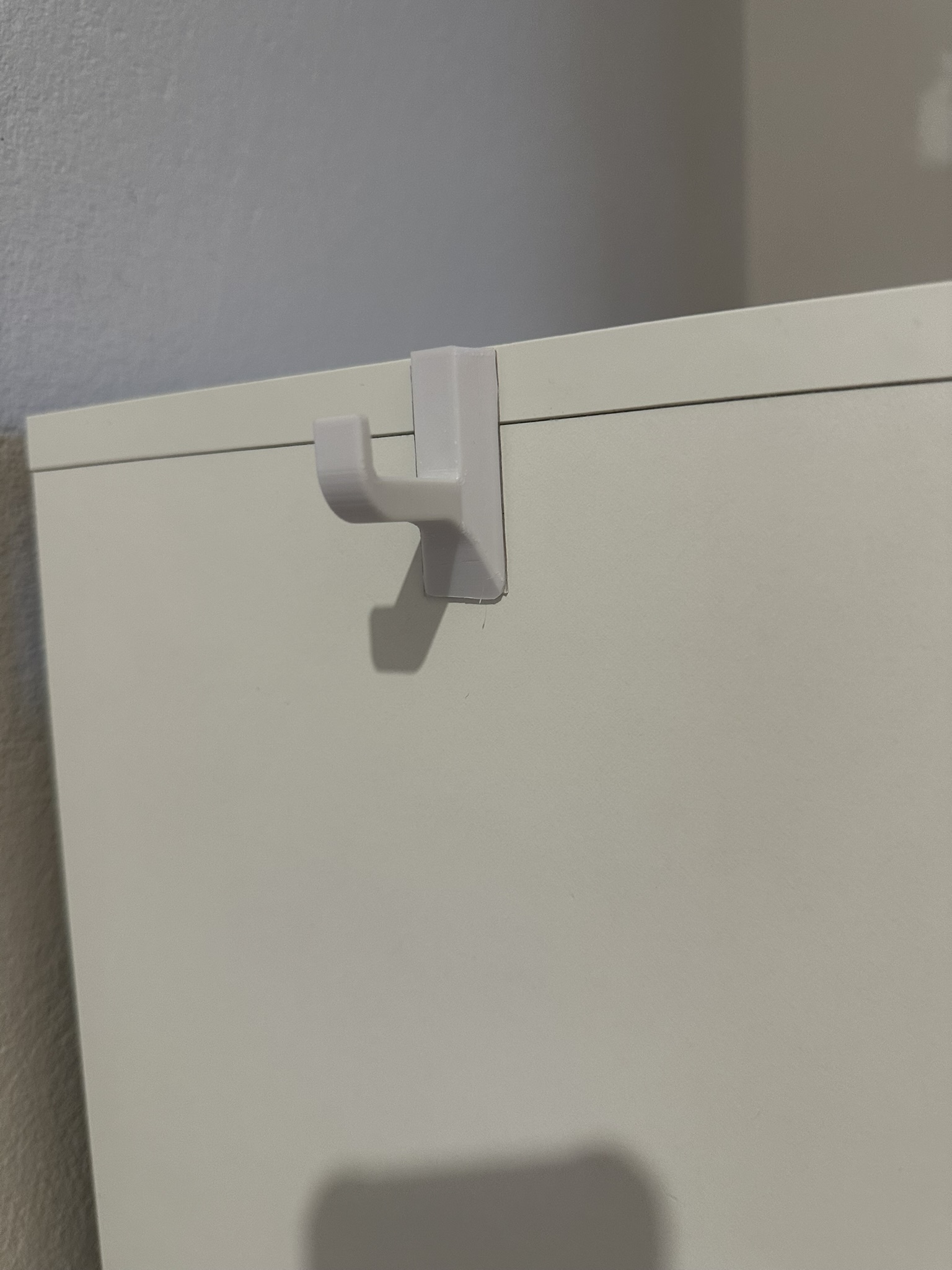 Hanger for the side of furniture