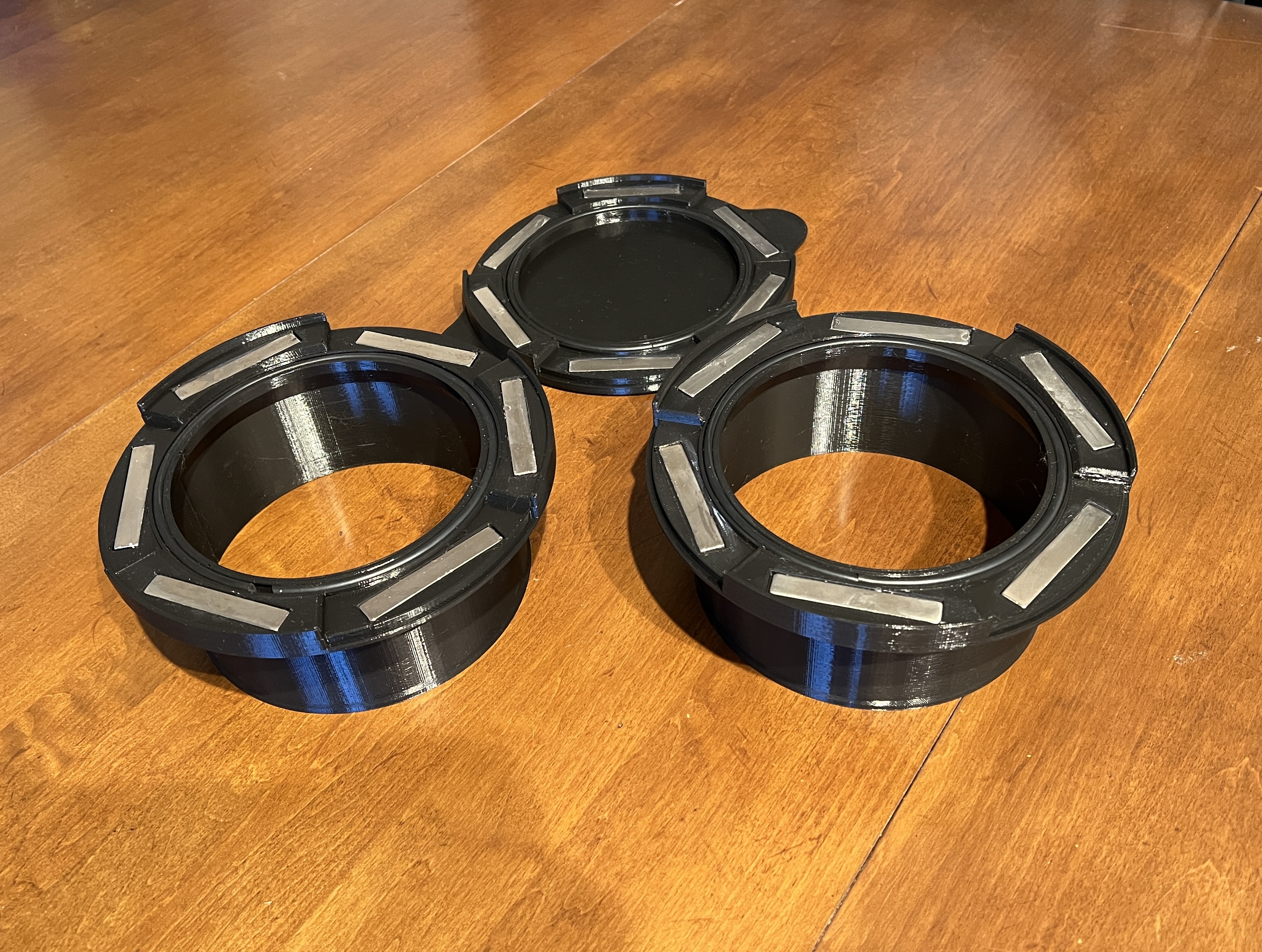6 in (six inch; 6") magnetic duct union couplers, with sealing cap and wall connector