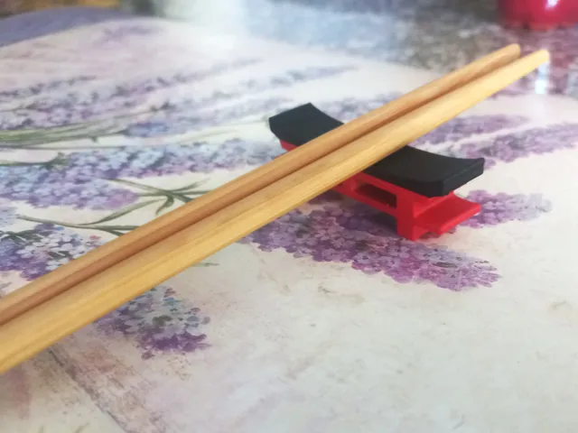 Japanese portal inspired chopsticks / cutlery rest holder