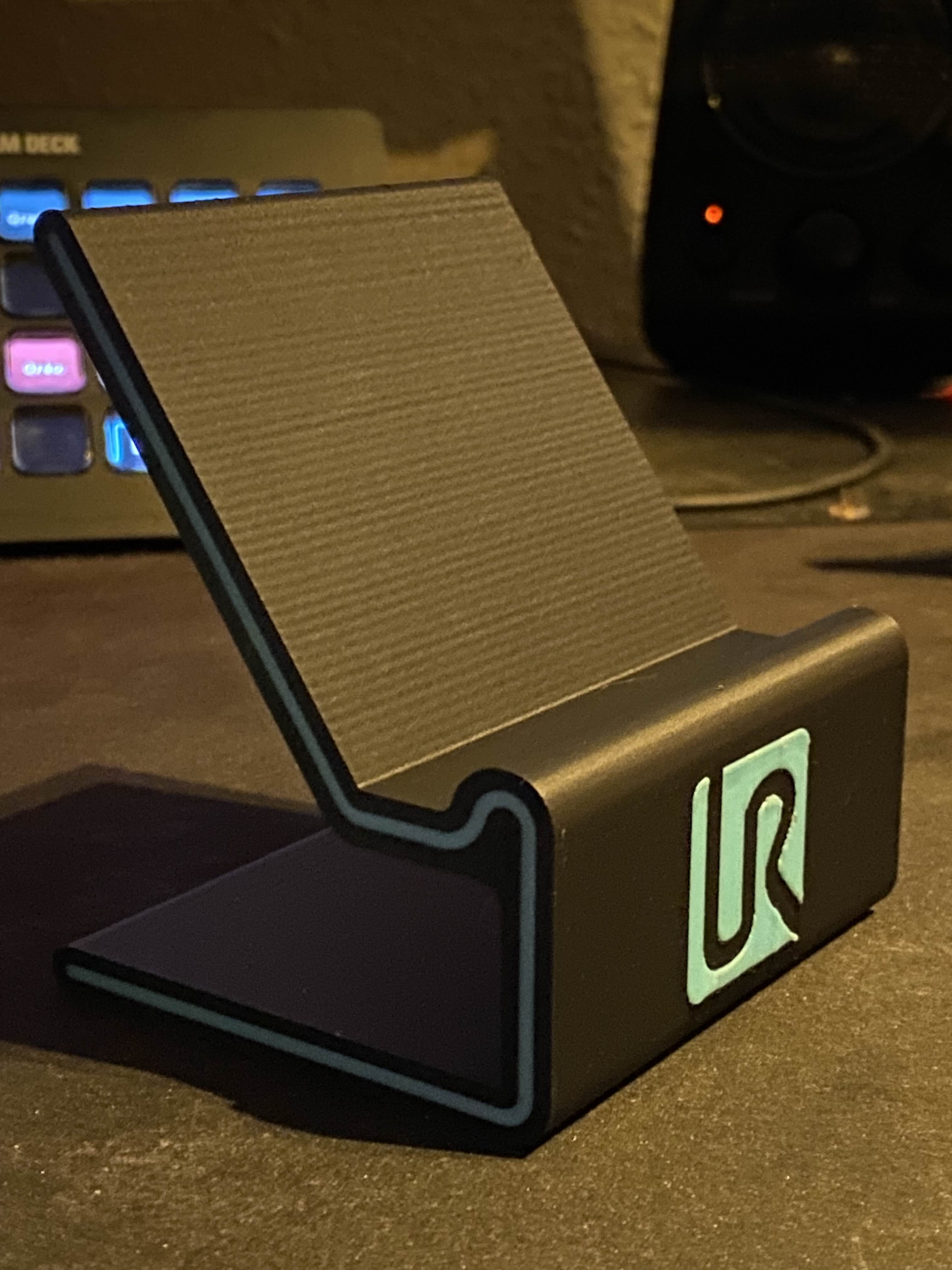Phone stand with accent
