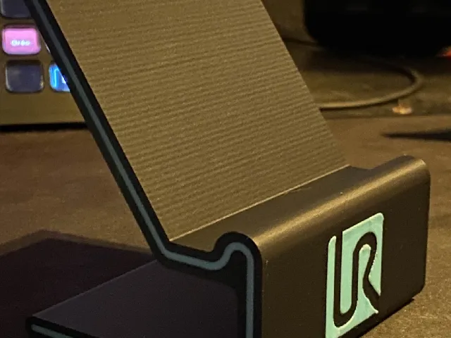 Phone stand with accent