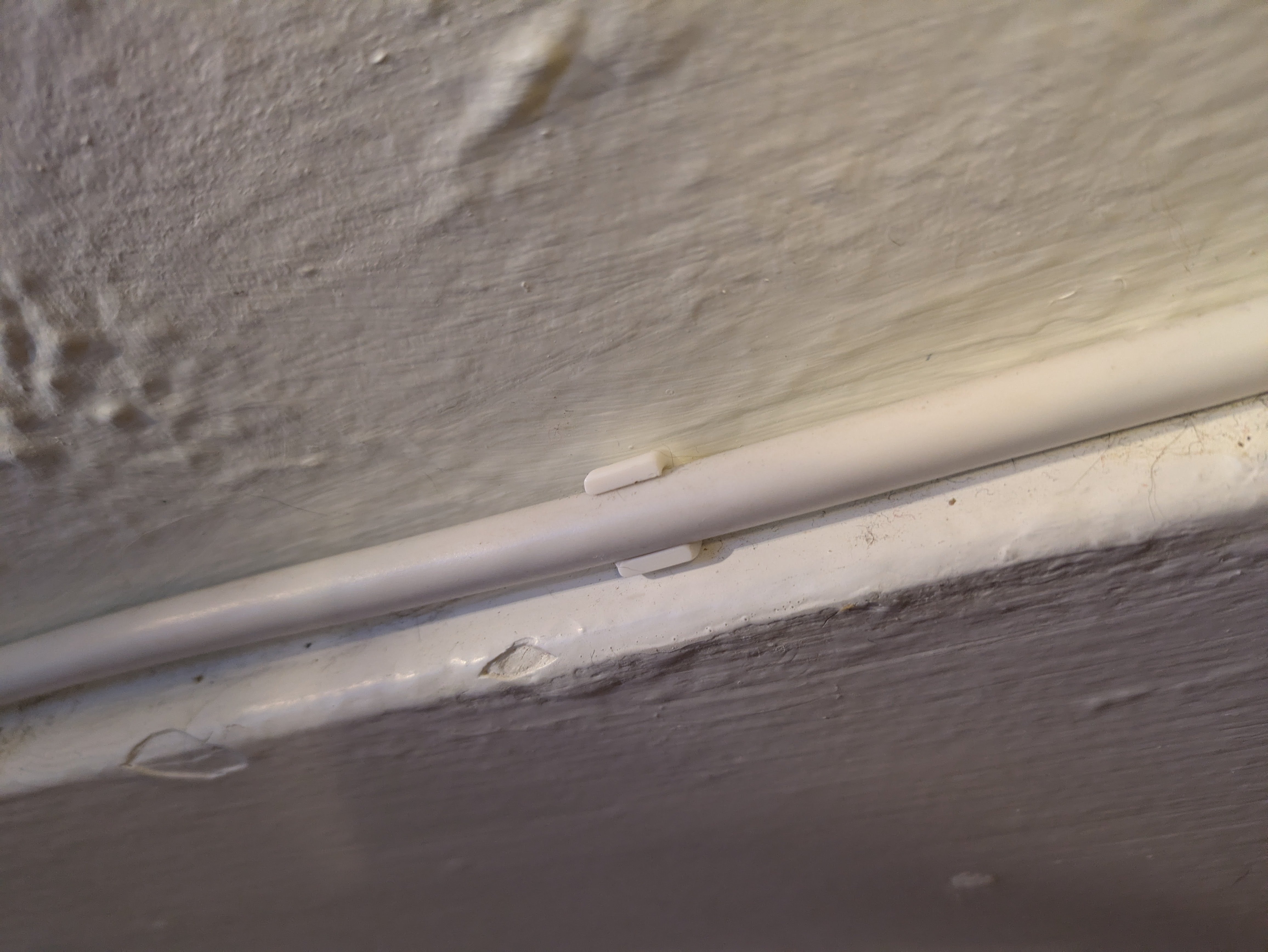 Angled Baseboard Extension Cord Clip
