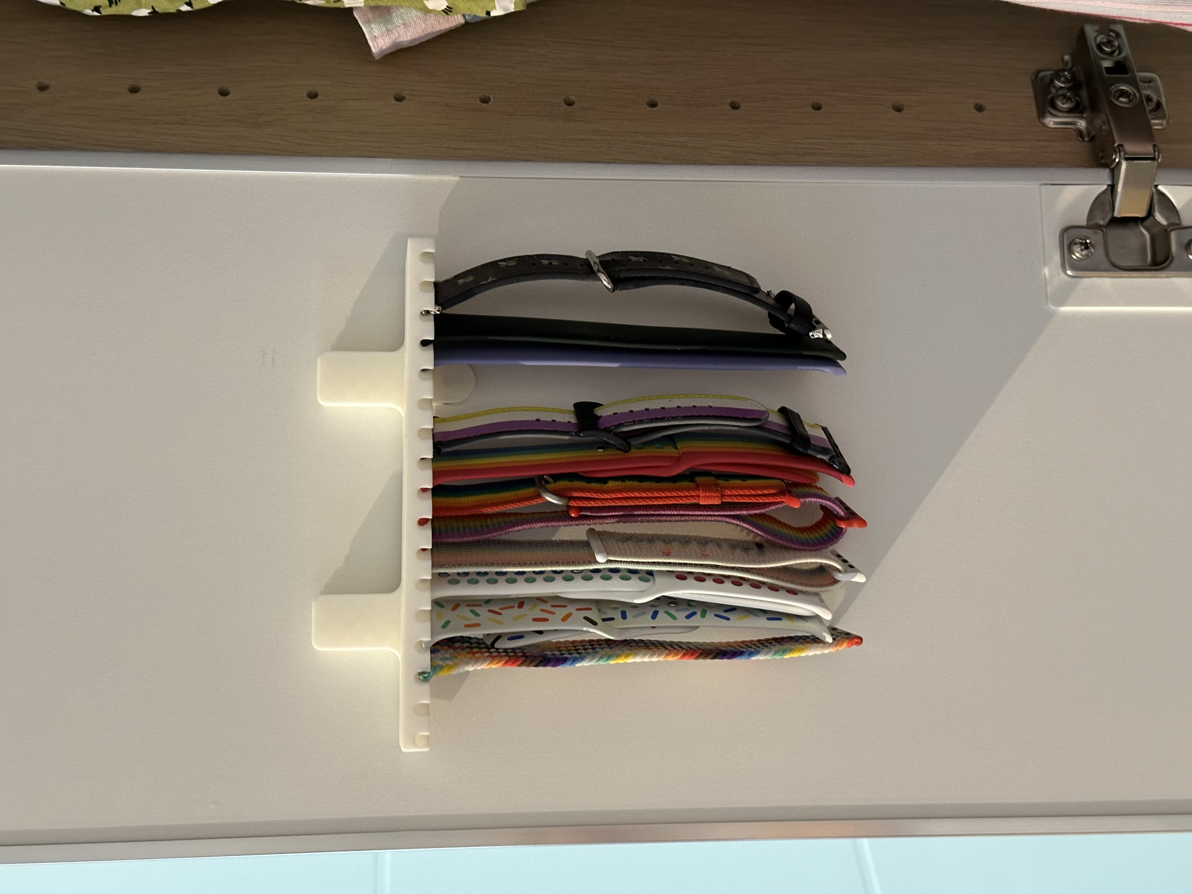 Apple Watch strap holder using slots