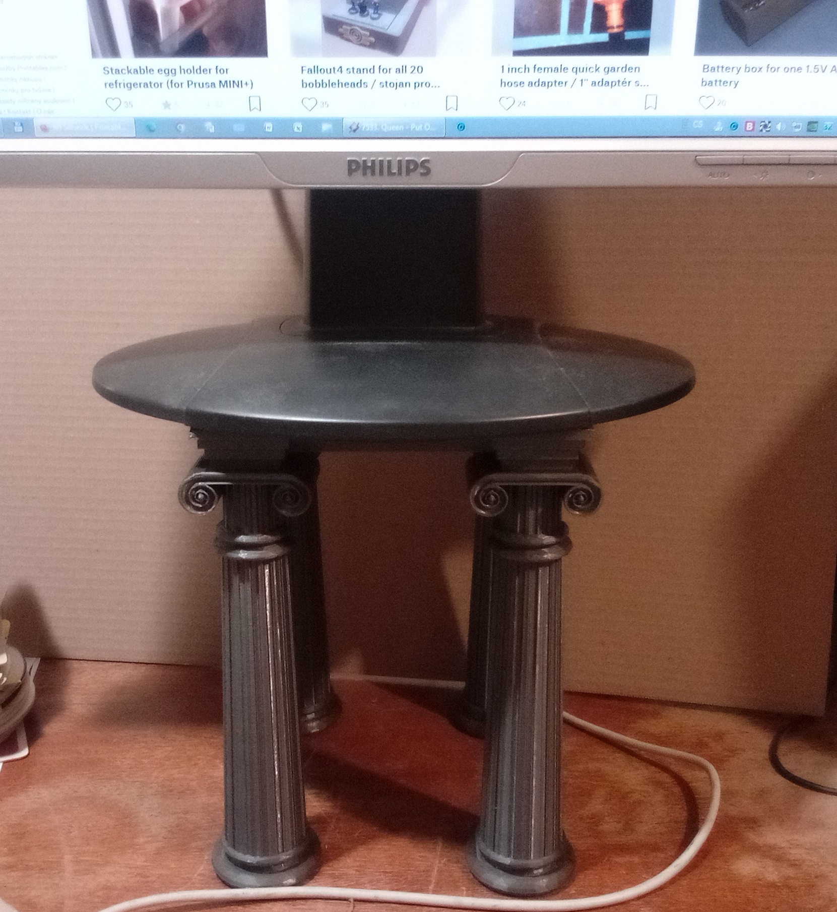 Stand in Greek architectural style