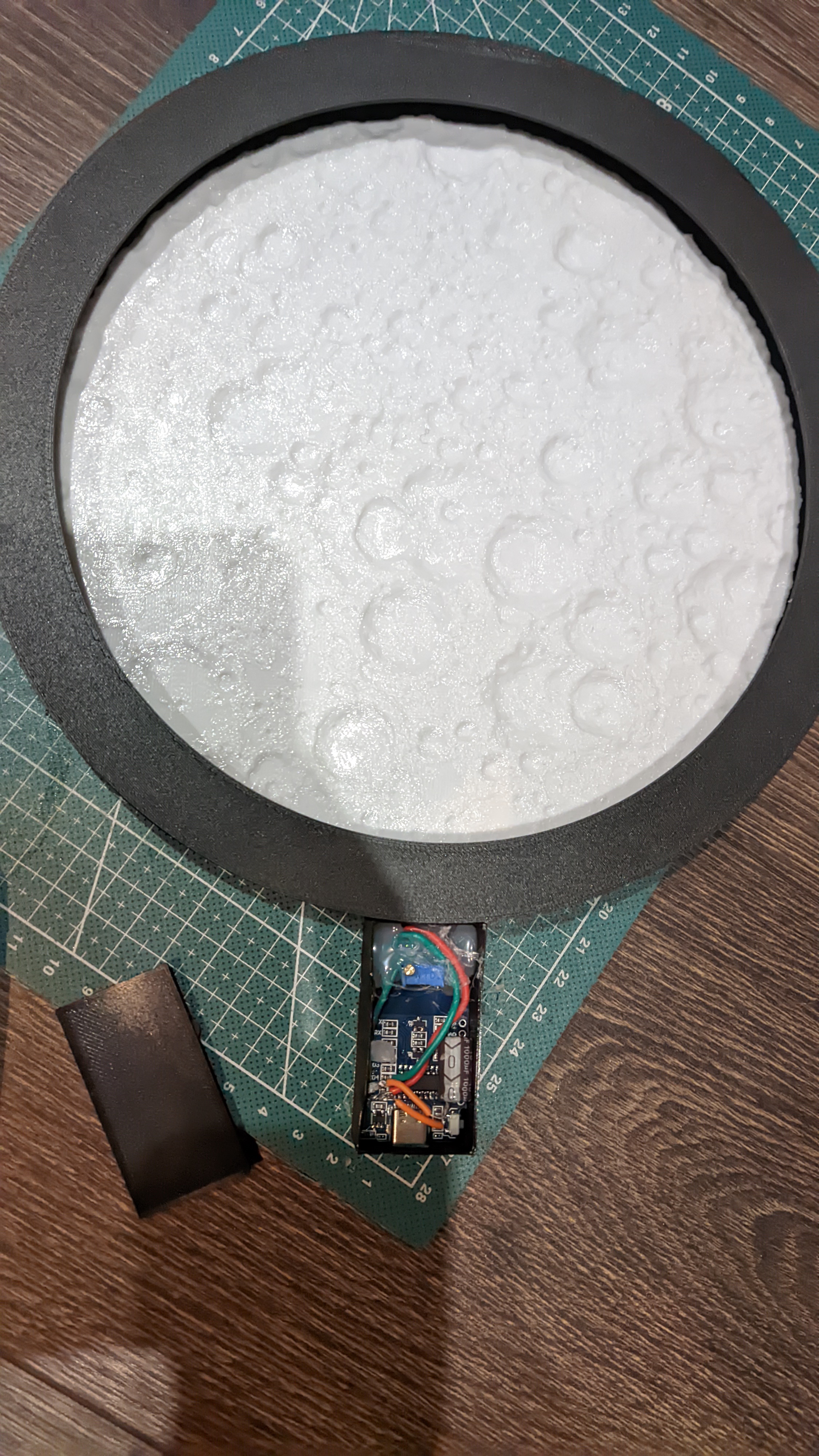 Moon-shaped night light