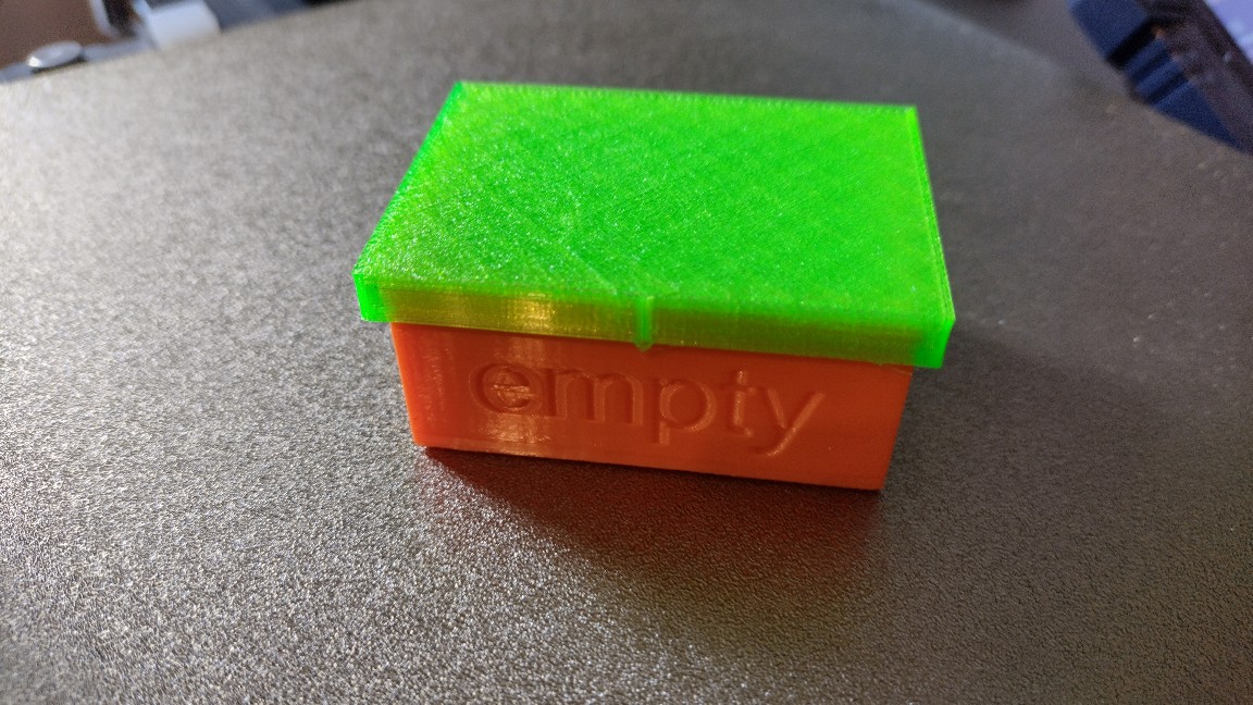 Storage box with TPU lid for Lumix battery.