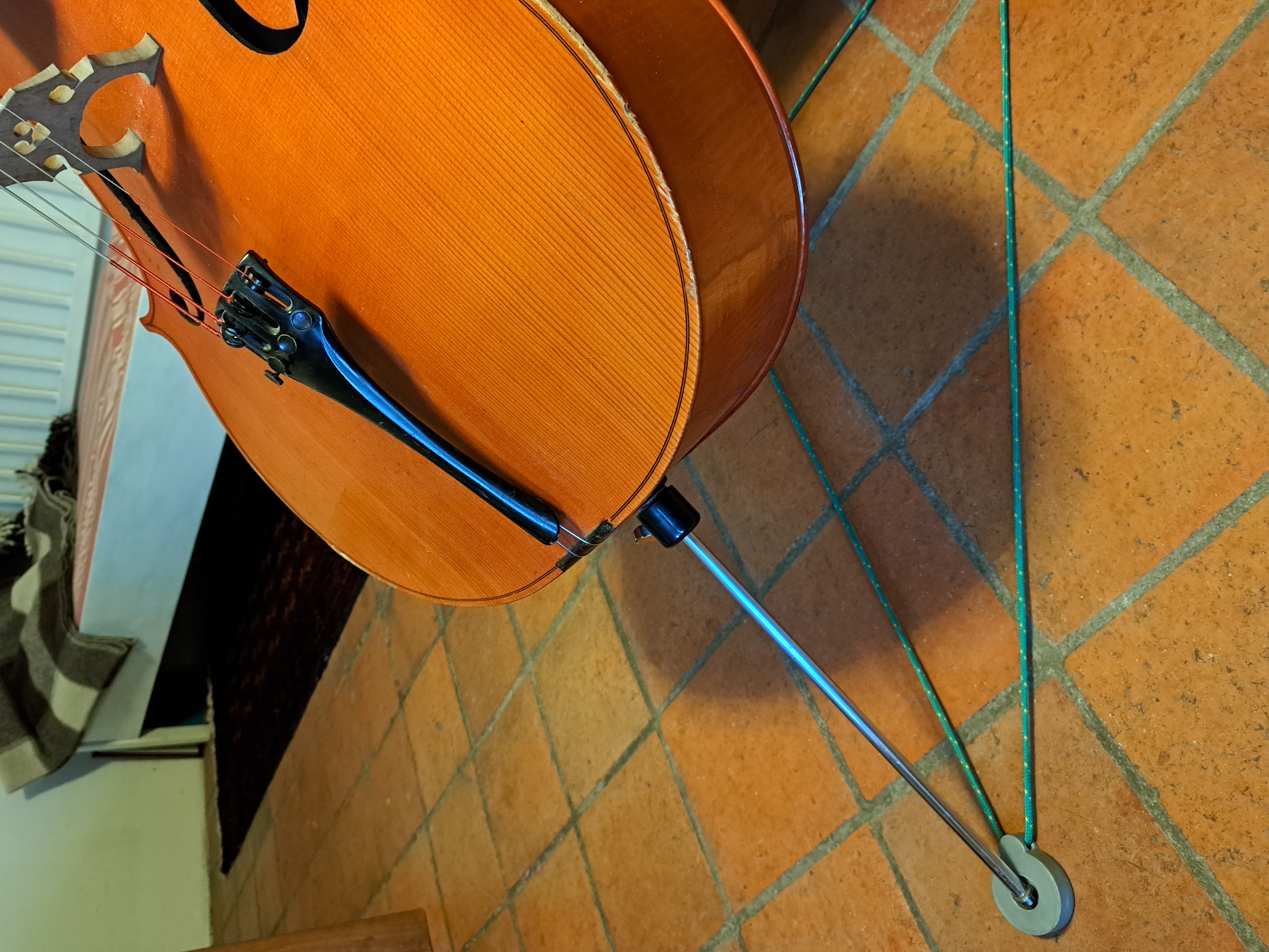 Violoncello pin stopper
