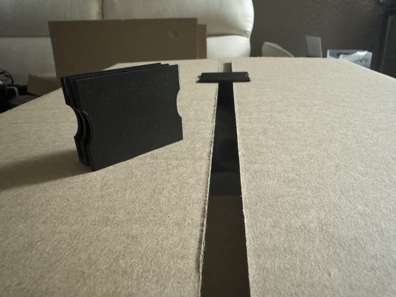 Clip for cardboard box