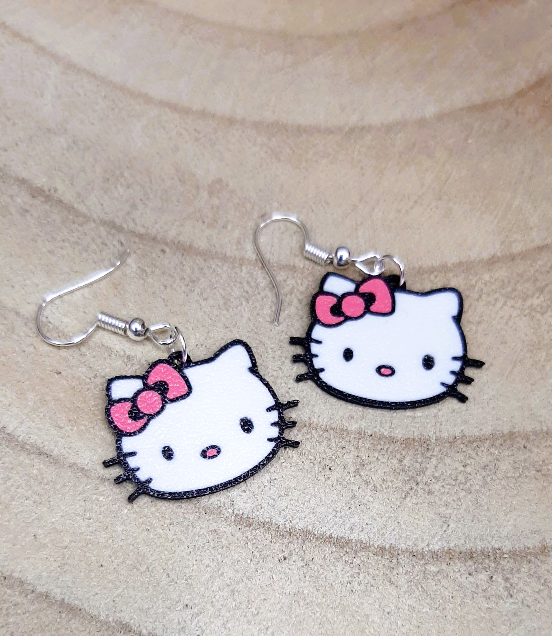 Hello Kitty face earrings