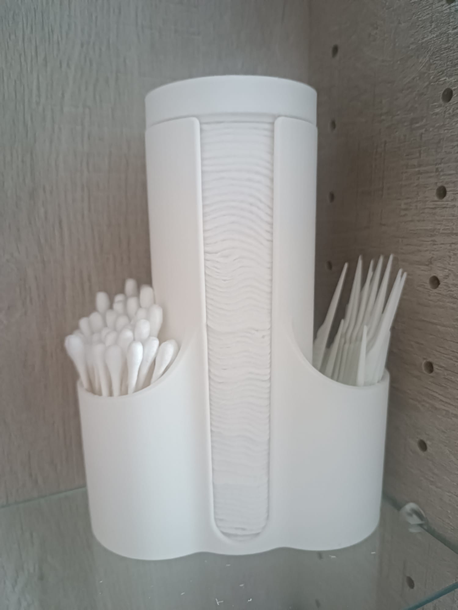 cotton pad, q-tip holder and floss