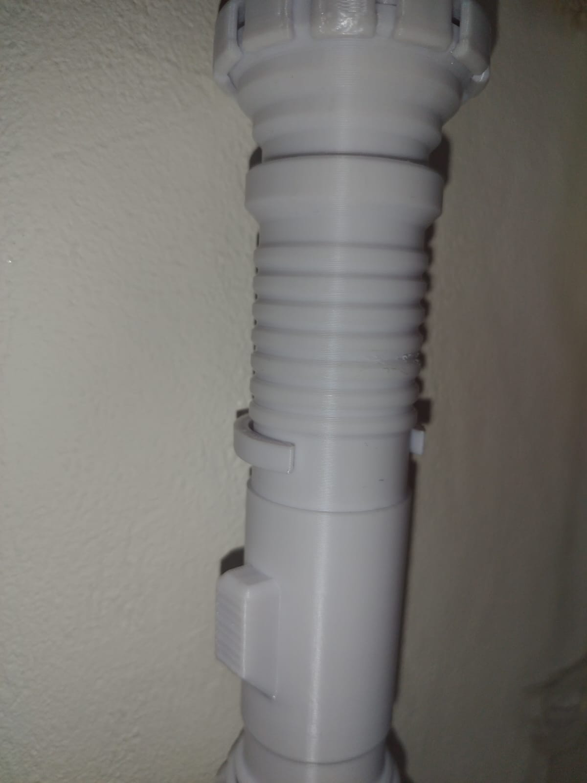 Wall holder for collapsible Lightsaber