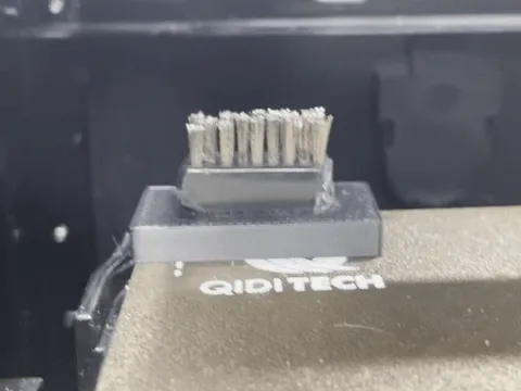Magnetic Mount for a Nozzle Scrub Brush or Wiper