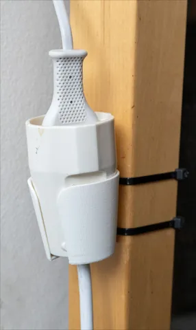 Power cord outlet holder