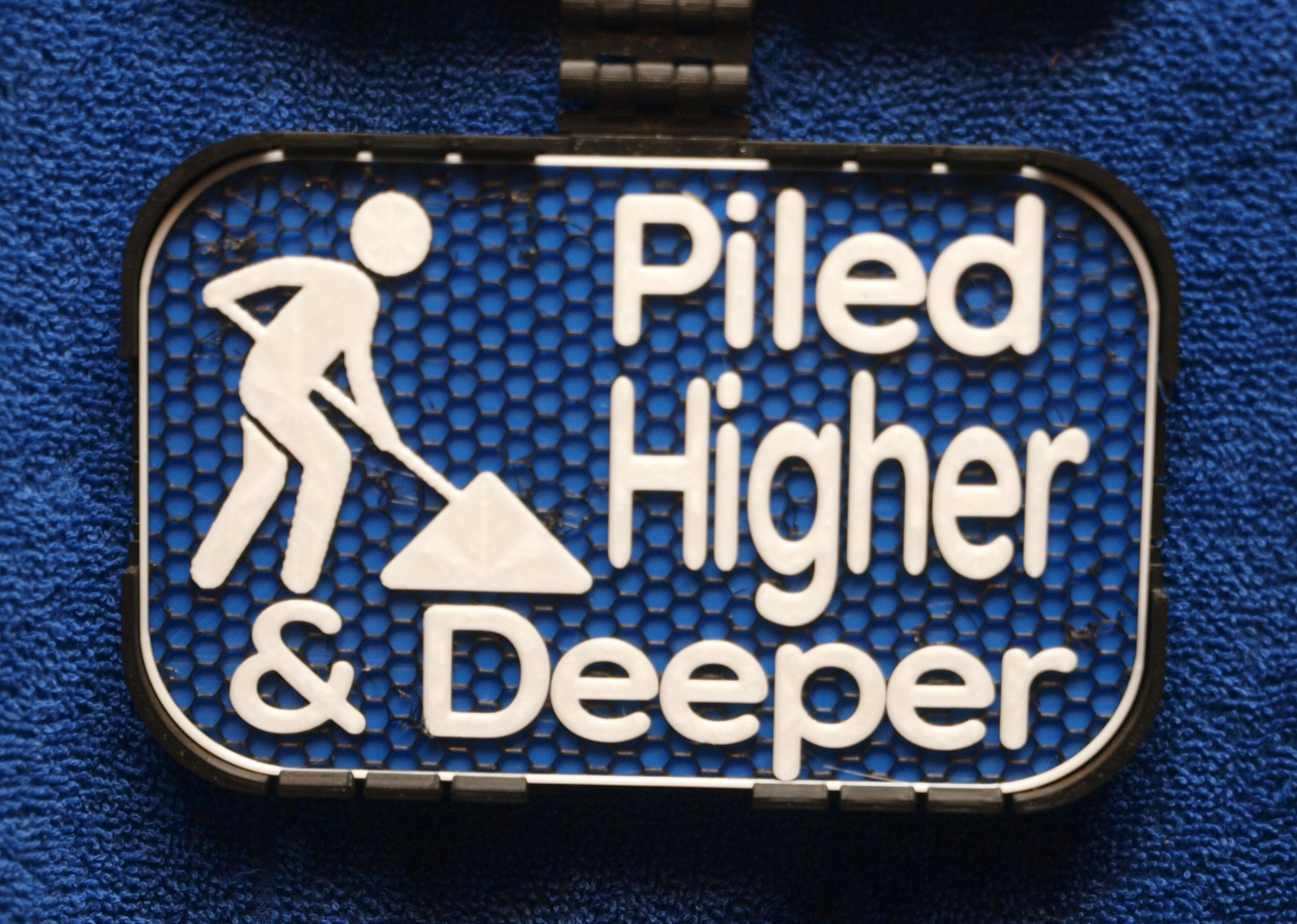 Piled Higher and Deeper sign