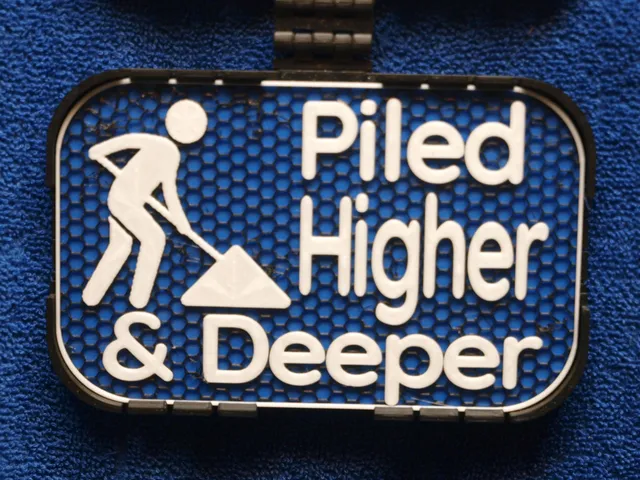 Piled Higher and Deeper sign