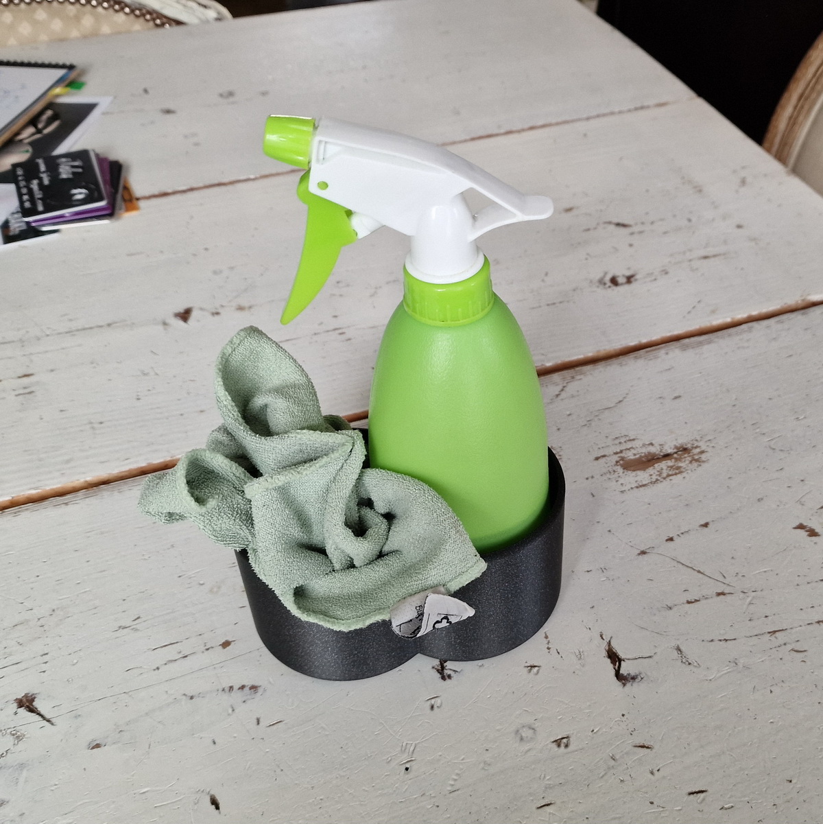 Holder for spraybottle and cloth