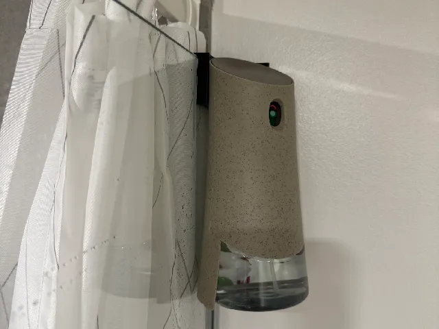 Corner bracket for Air Wick Air Freshener
