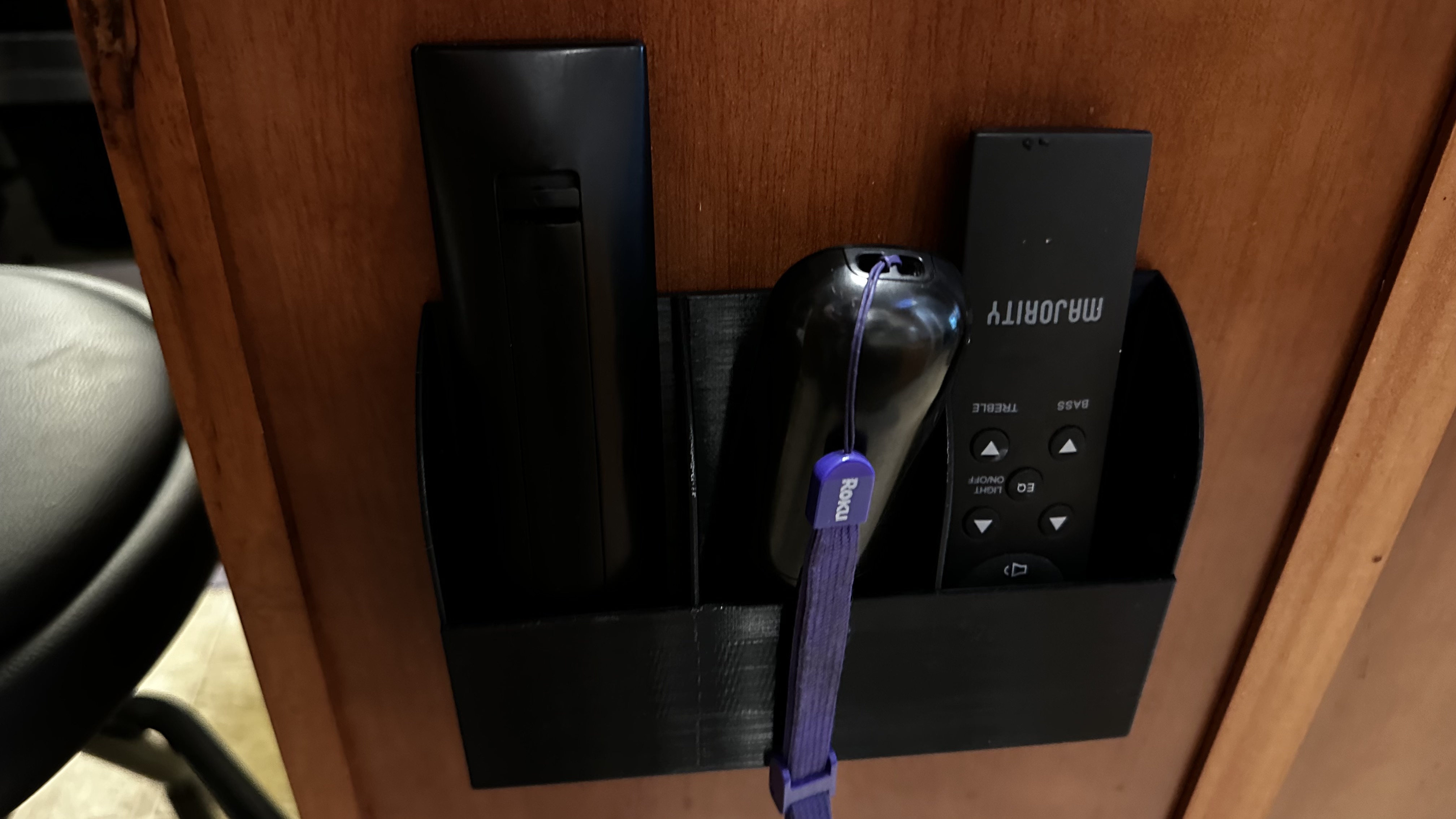Wall mounted remote control holder (3 slots)