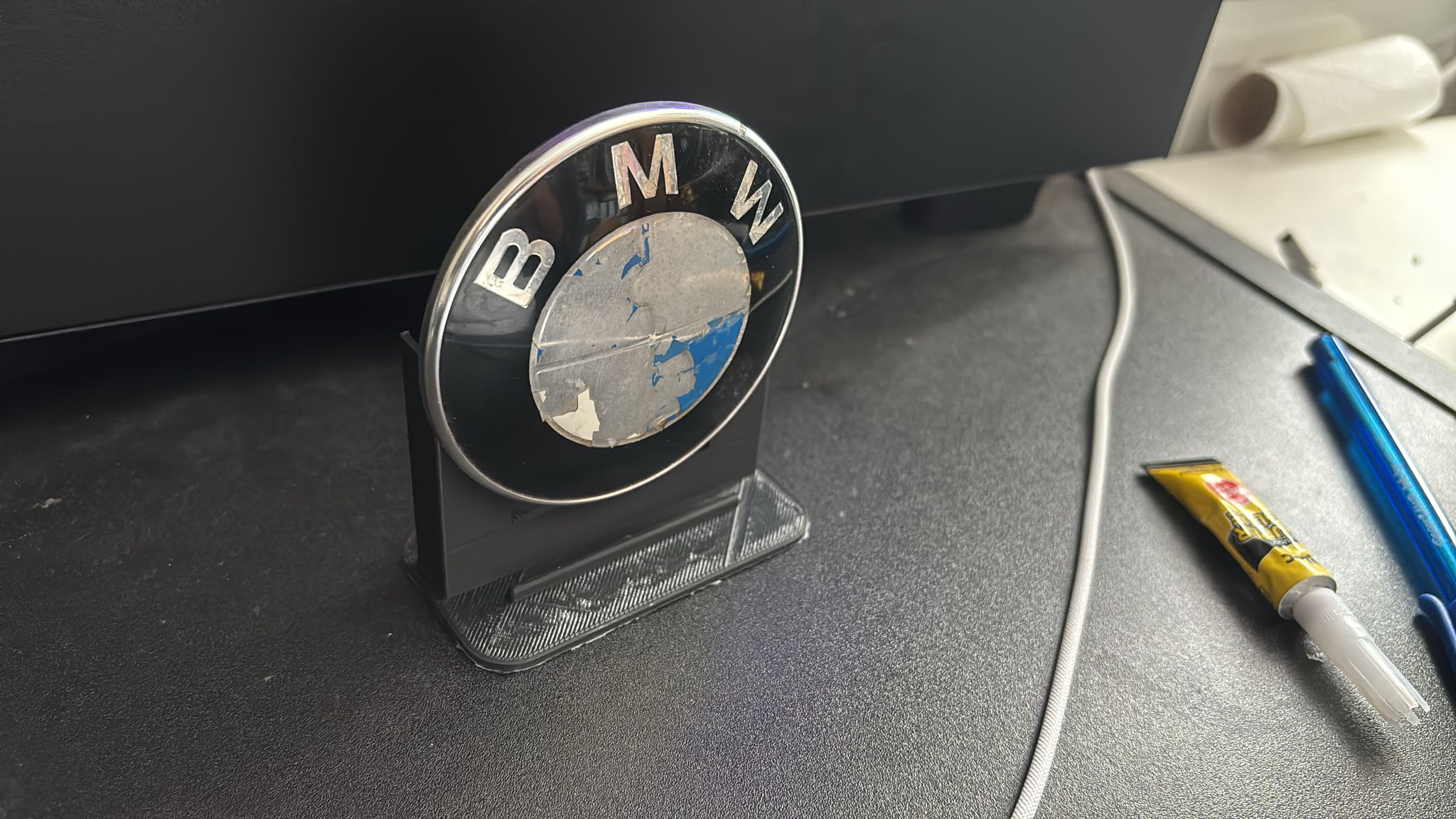 Stand for a BMW badge