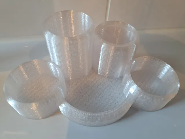 Toothbrush + toothpaste holder