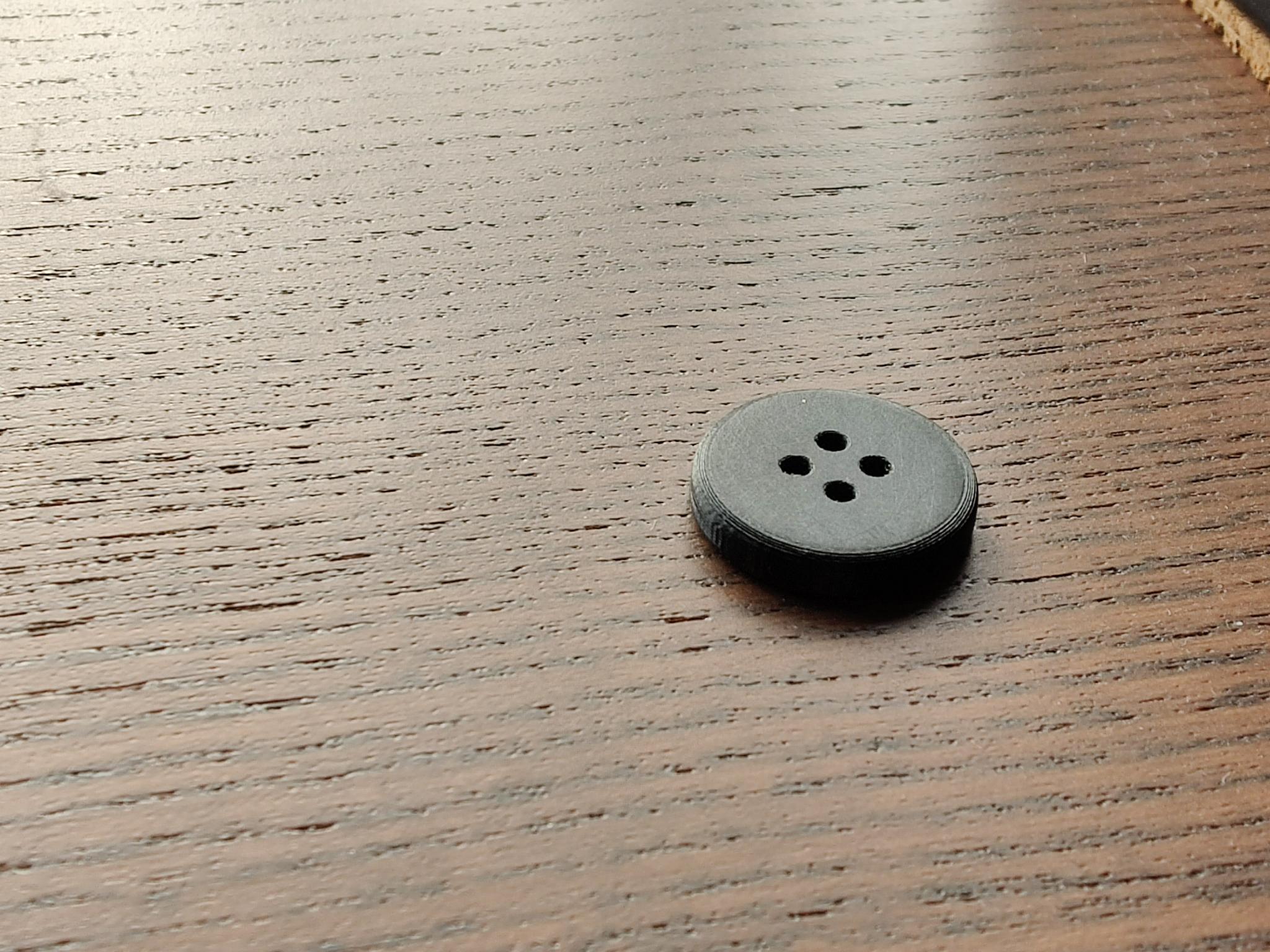 Spare button for clothing
