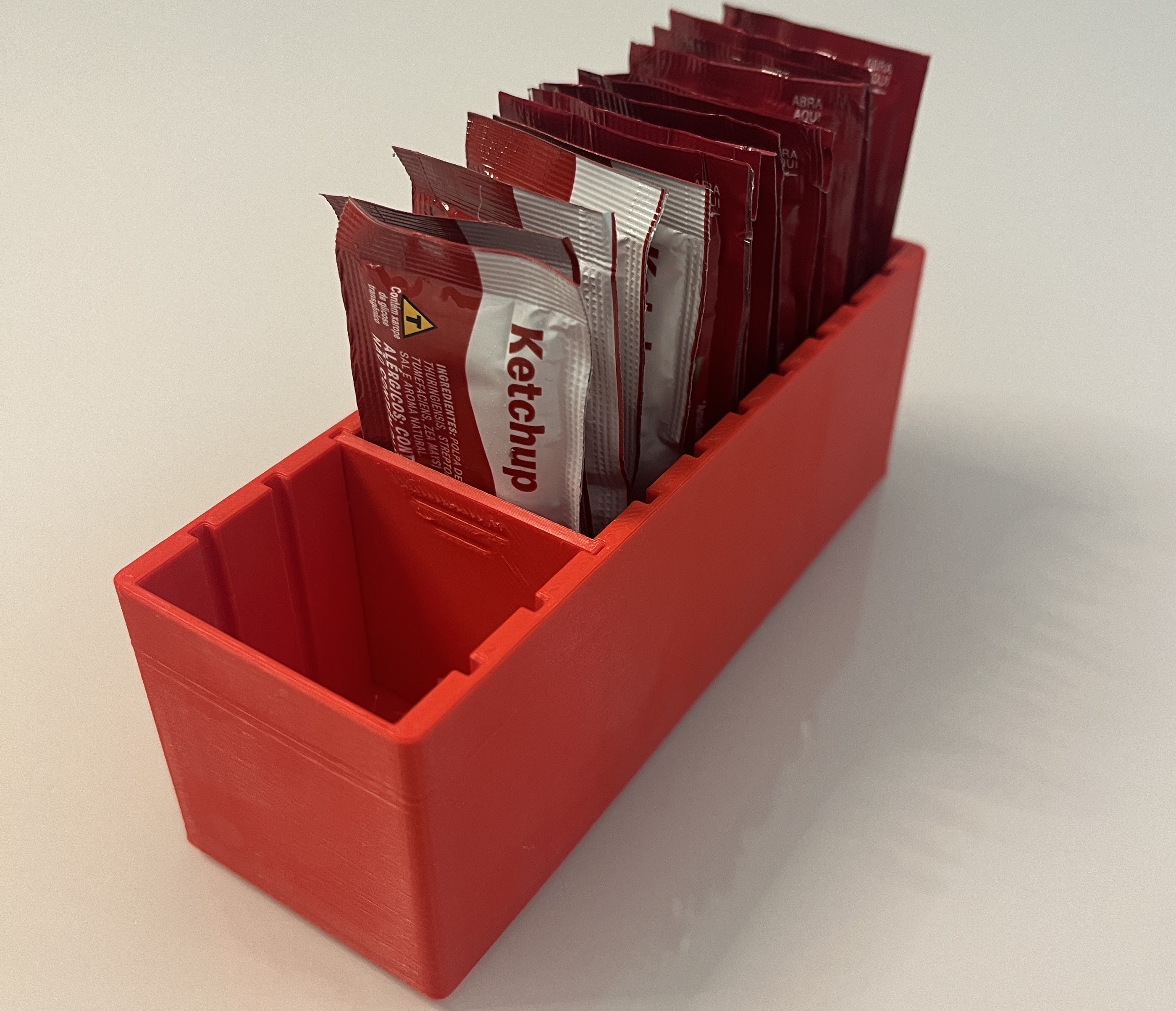 Adjustable sauce packet organizer