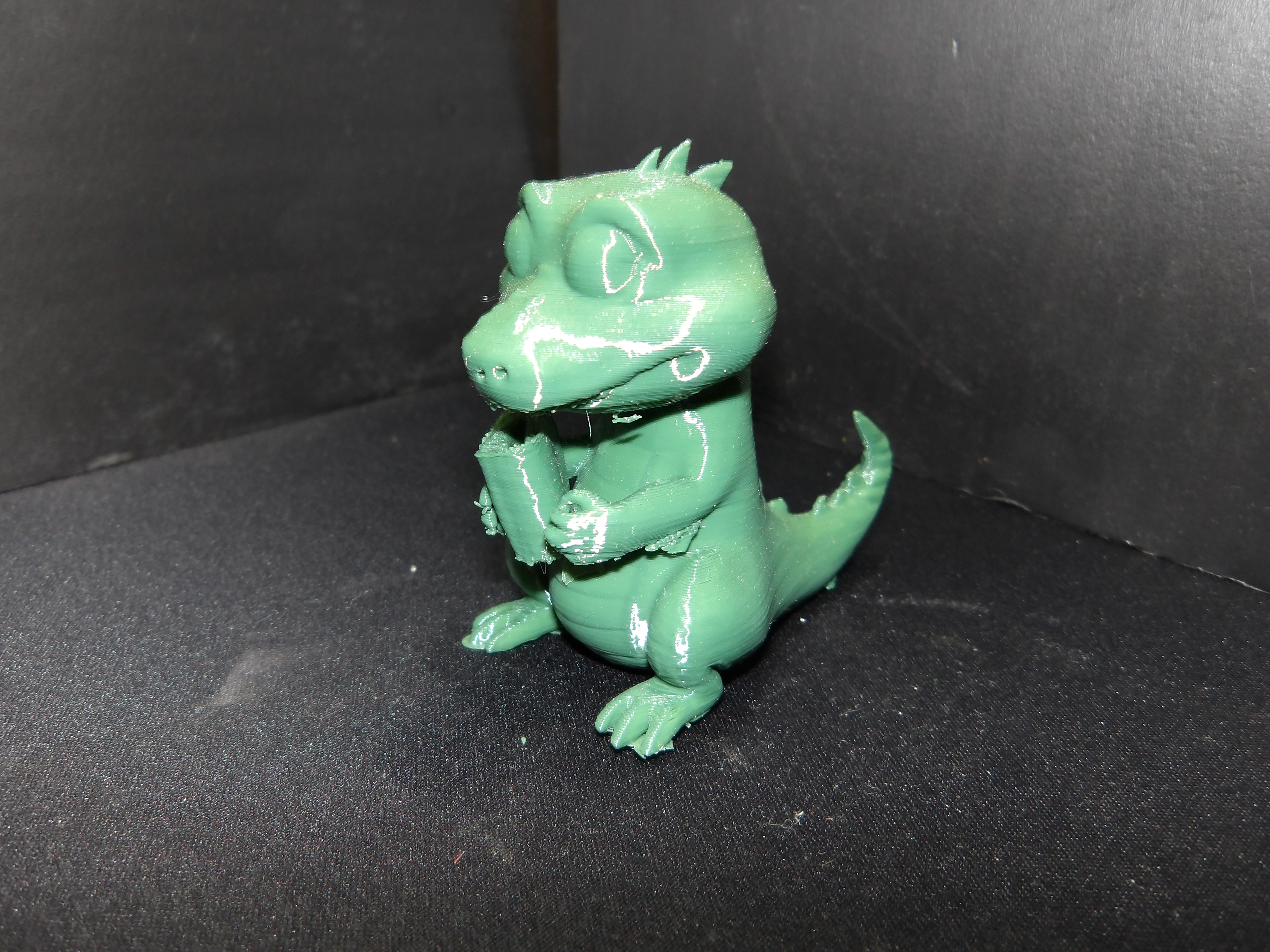 An Alligator with a book.