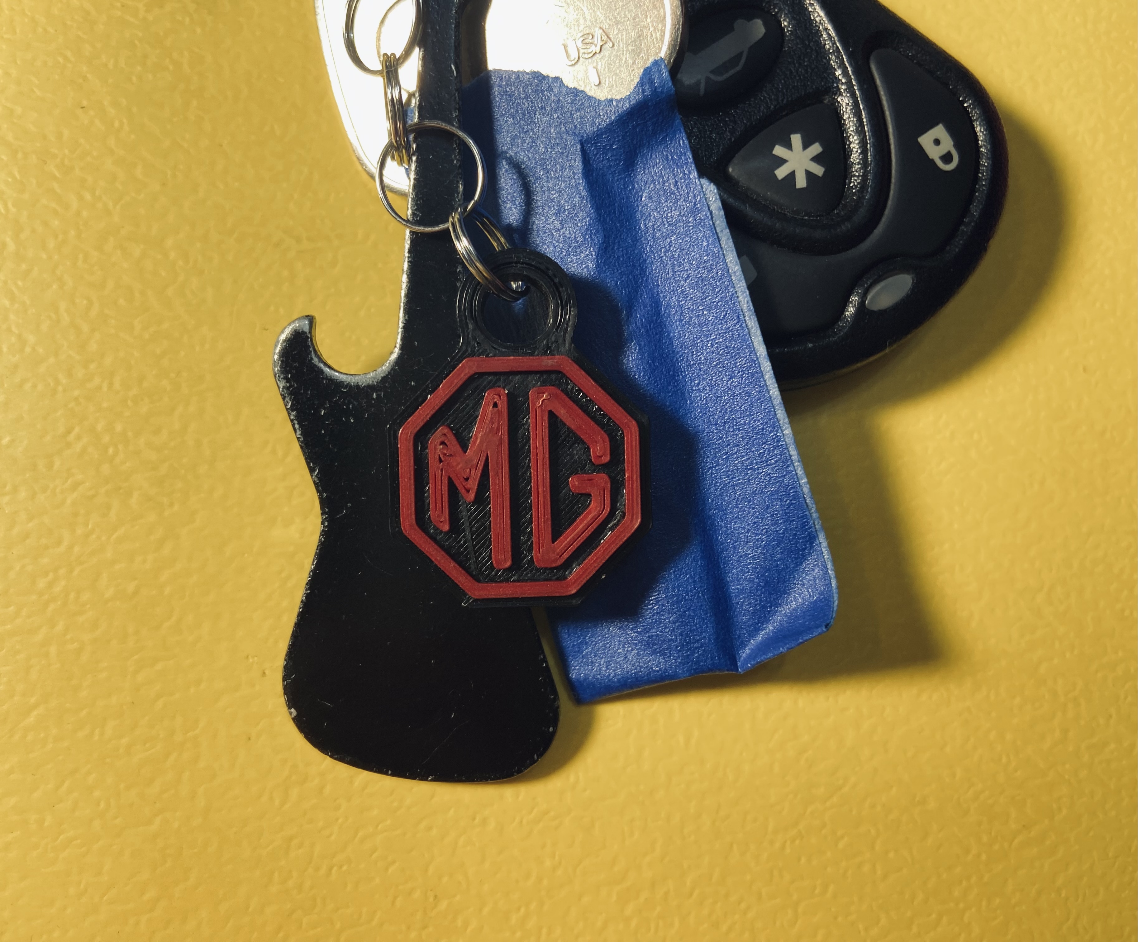Miniatura 2 do modelo 3D MG logo keychain